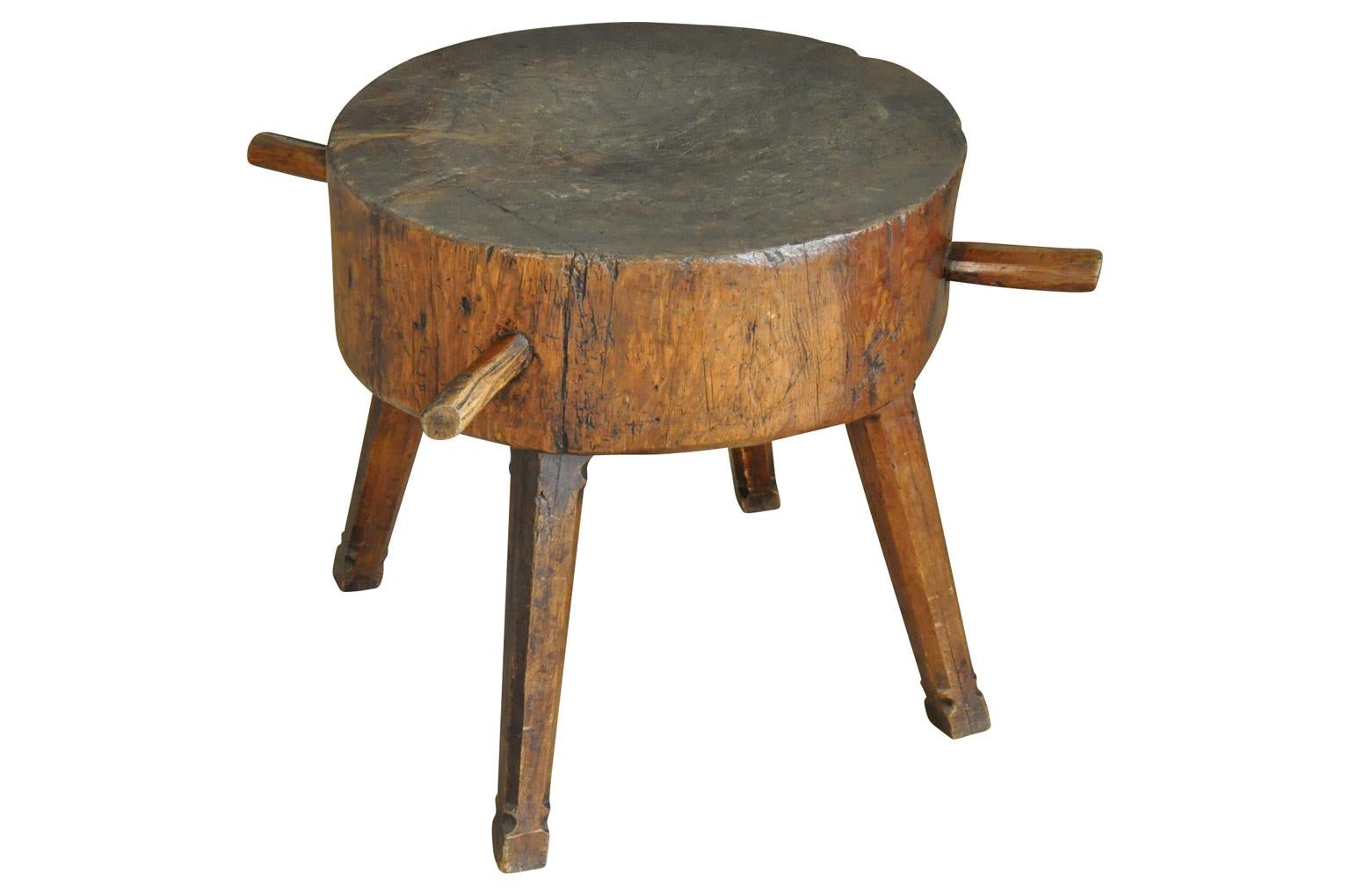 A 19th century Primitive Billot - Chopping block from northern Italy. A wonderful side table for a casual surrounding.