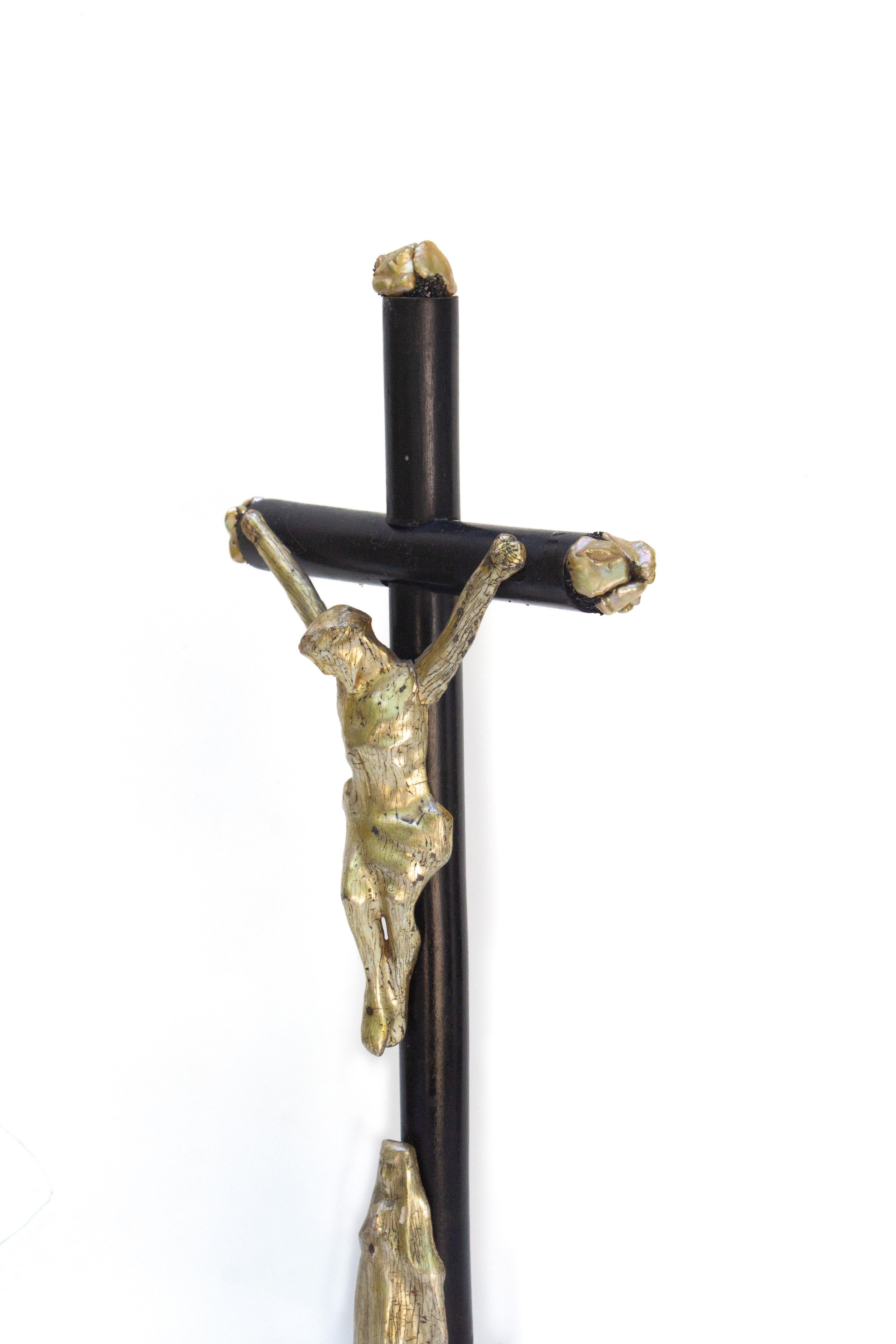 Carved 19th Century Italian Black Crucifix with a Pearlescent Gold Figure of Christ