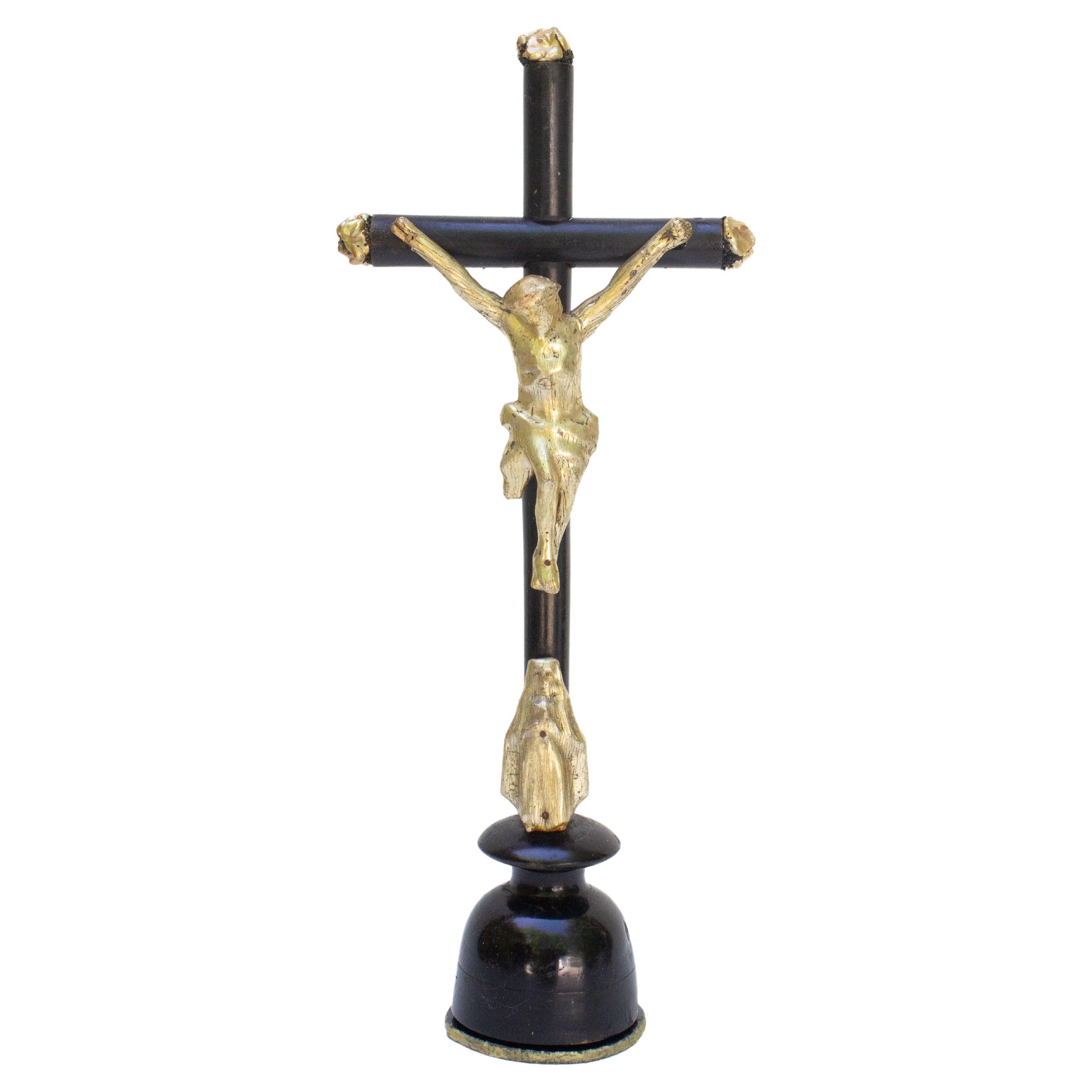 19th Century Italian Black Crucifix with a Pearlescent Gold Figure of Christ