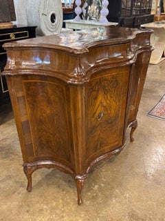 19th Century Italian Black Walnut Shaped Front Cabinet
