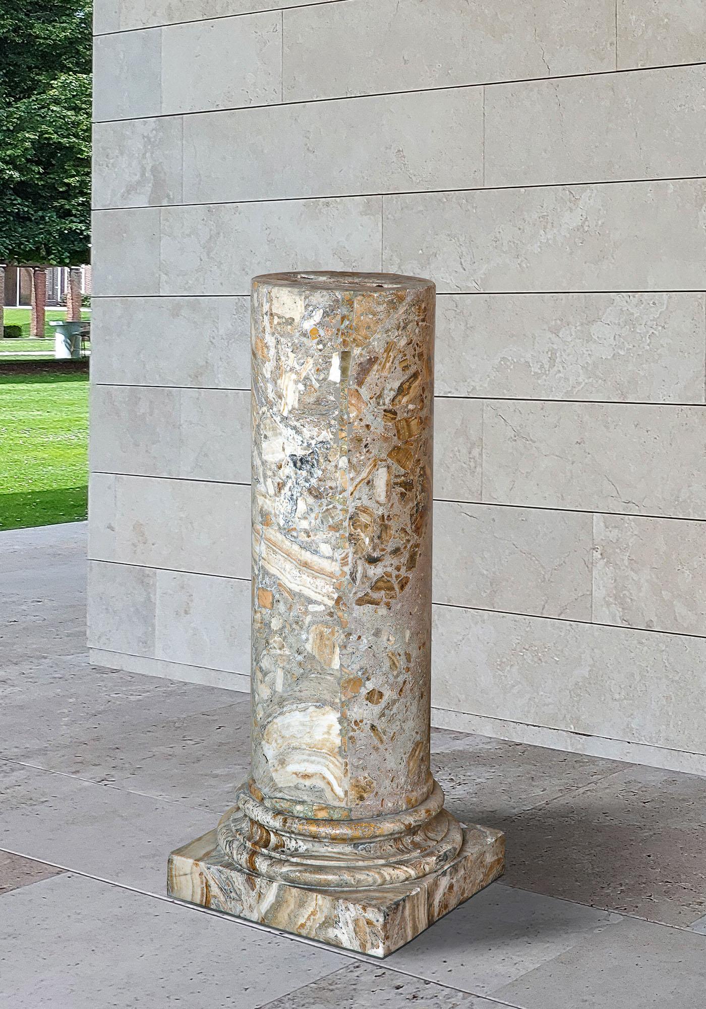 19th Century Italian brecciated marble column or pedestal. The marble is soft yellow pink tones. The base is round with a square base.

h 116 x diameter 33 cm
base: l 46 x w 46 cm