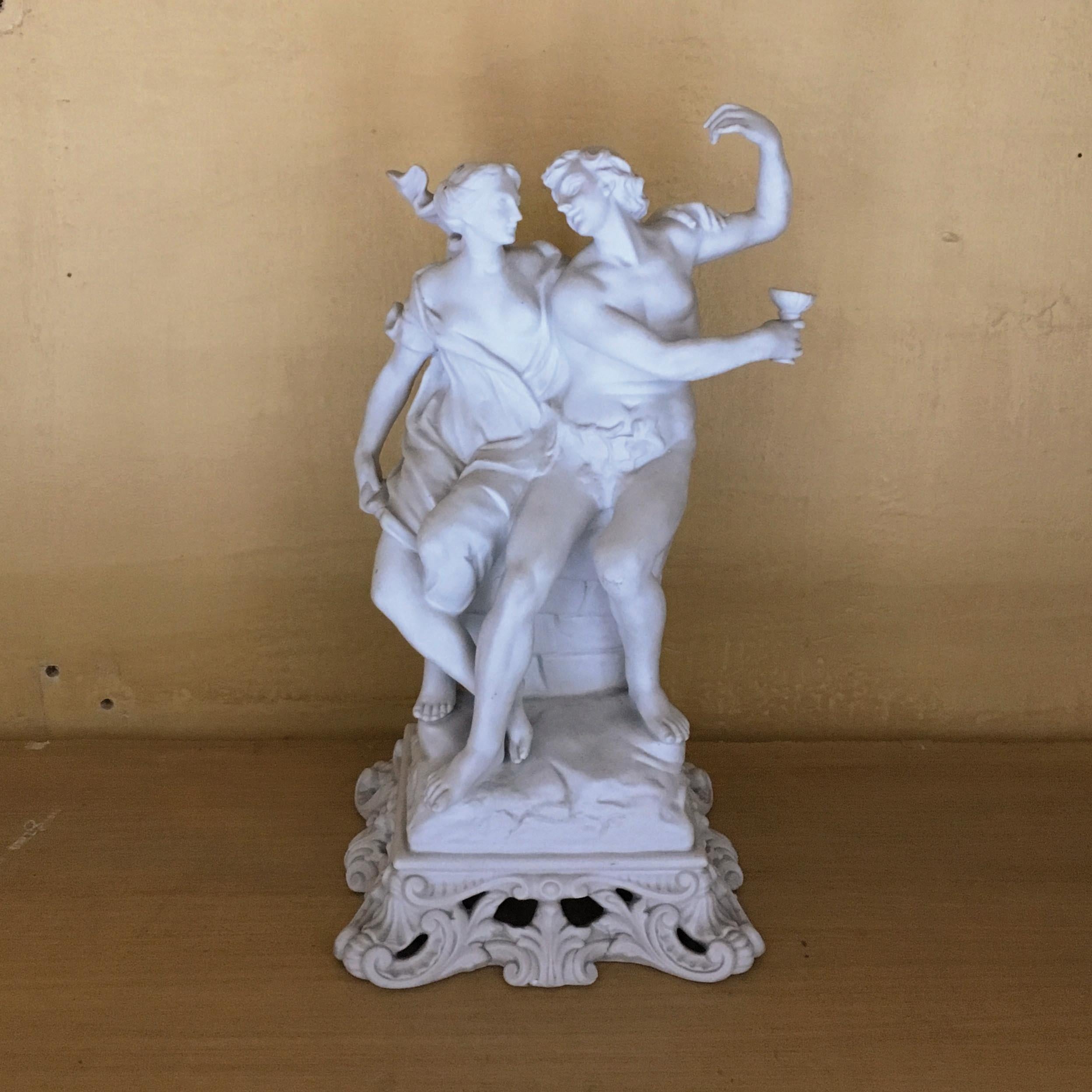 A charming Italian Capodimonte white biscuit porcelain sculpture.
This high quality antique centerpiece depicts a cheering couple of lovers.
Capodimonte mark, a blue crowned 'N' underneath the base of sculpture.
Capodimonte, Ginori factory in