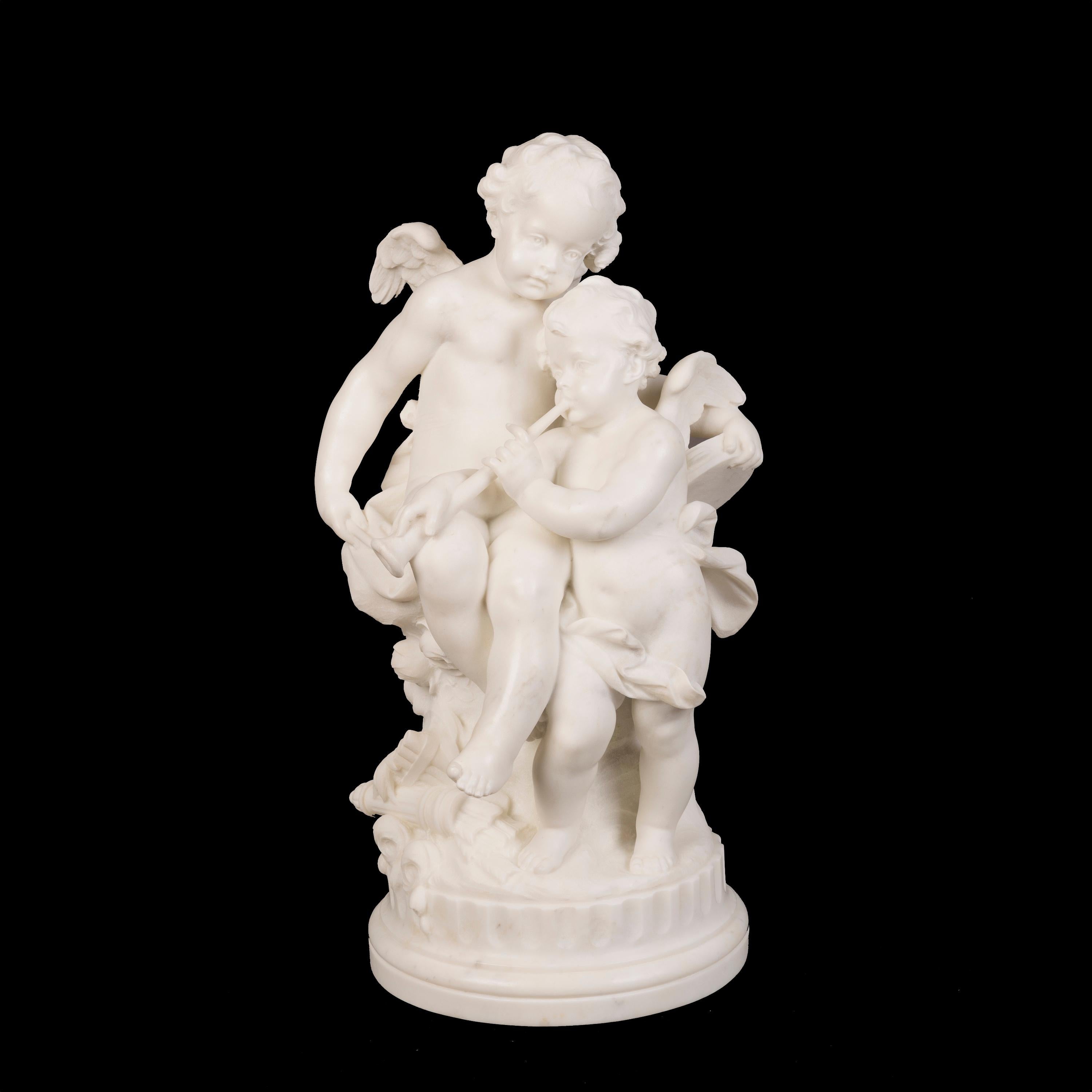 Allegories of the Greek Gods Eros & Erato
An Italian Carved Sculptural Group

Carved from a single block of Carrara marble, the winged putti cavorting together, one playing a trumpet and the other a tambourine. With a pan flute at their feet and