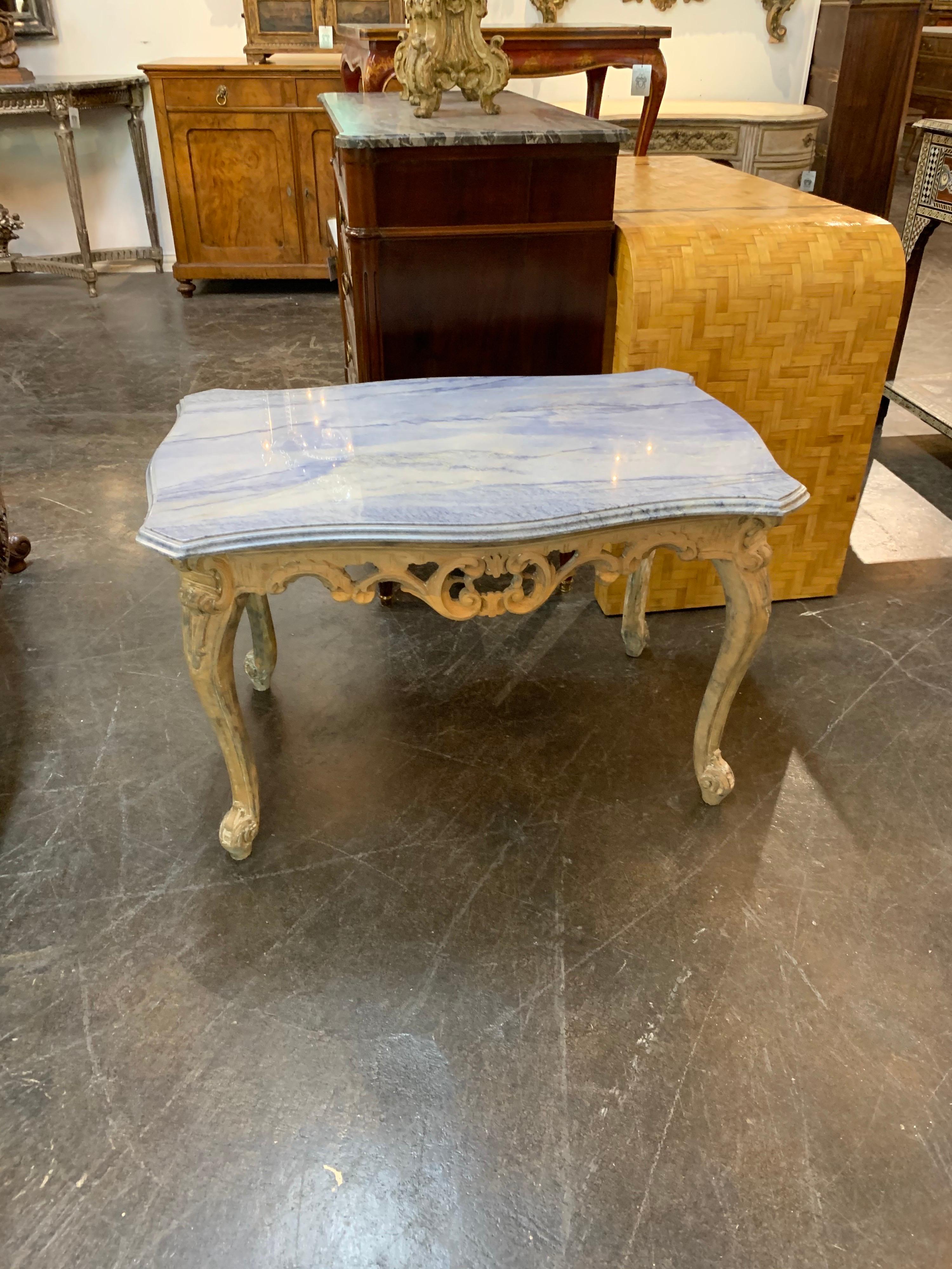 Very fine 19th century Italian carved and bleached side table. Nicely carved and the top is a beautiful piece of marble with an interesting blueish tint. A very handsome piece!