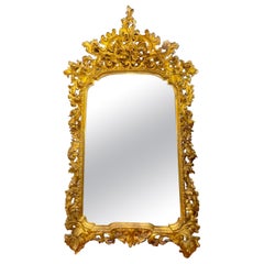 Specchio Florentine in legno dorato e intagliato dell'Ottocento italiano