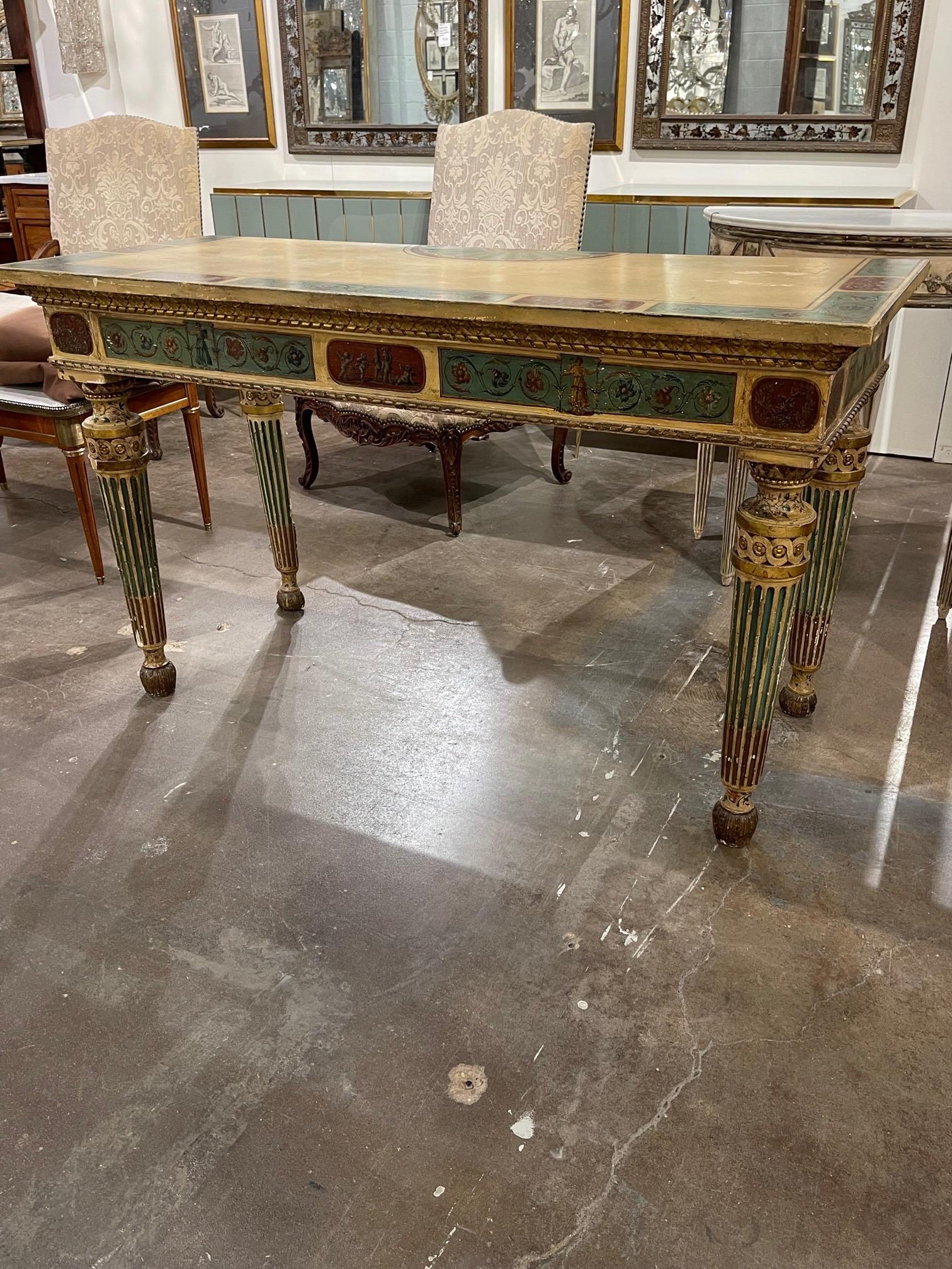 Beautiful 19th century Italian carved and painted console table. Very pretty neo-classical designs in red, green and gold. Very fine carving as well. Super special and so unique!