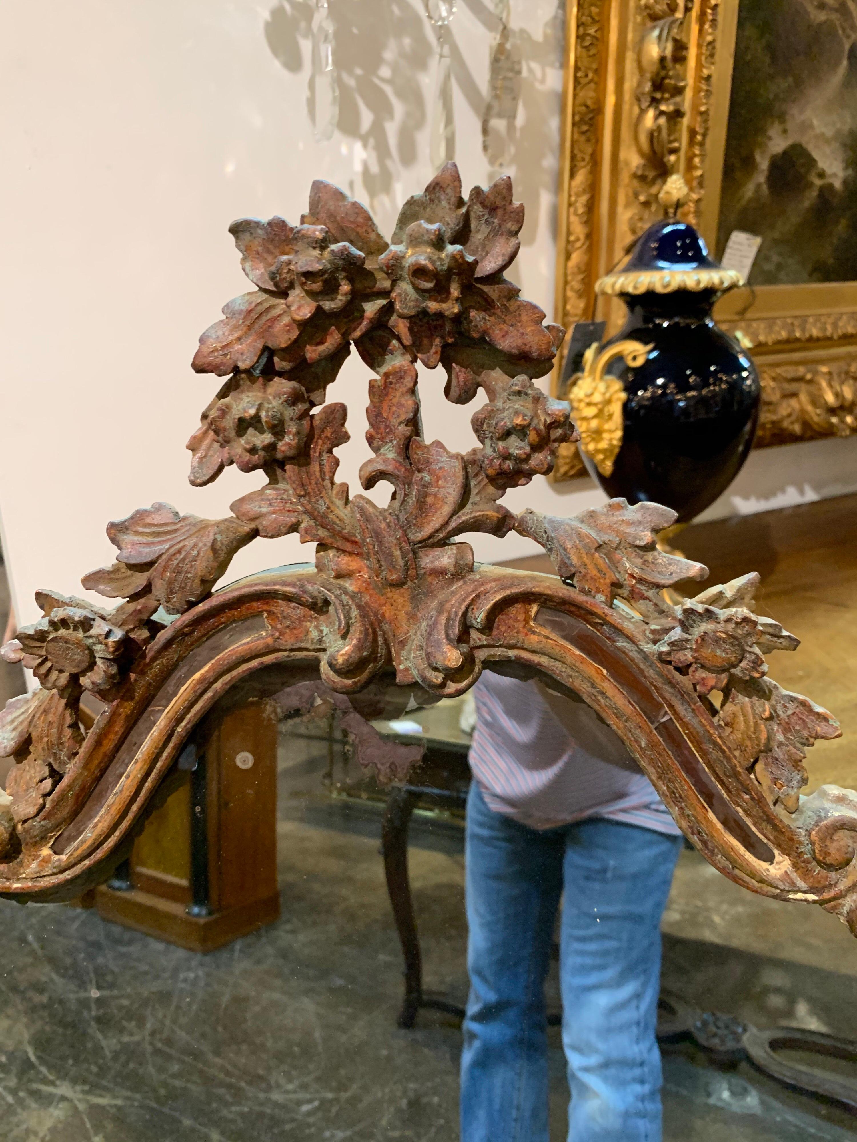 Very fine 19th century Italian carved and polychrome mirror. Beautiful carvings on this piece!