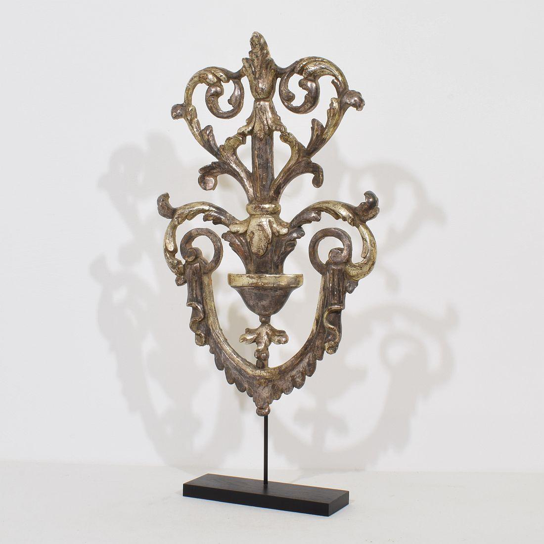 Wonderful hand carved wooden ornament in Baroque style with traces of its original silver. Italy circa 1880-1900
Weathered small losses and old repairs. measurements include the wooden base.