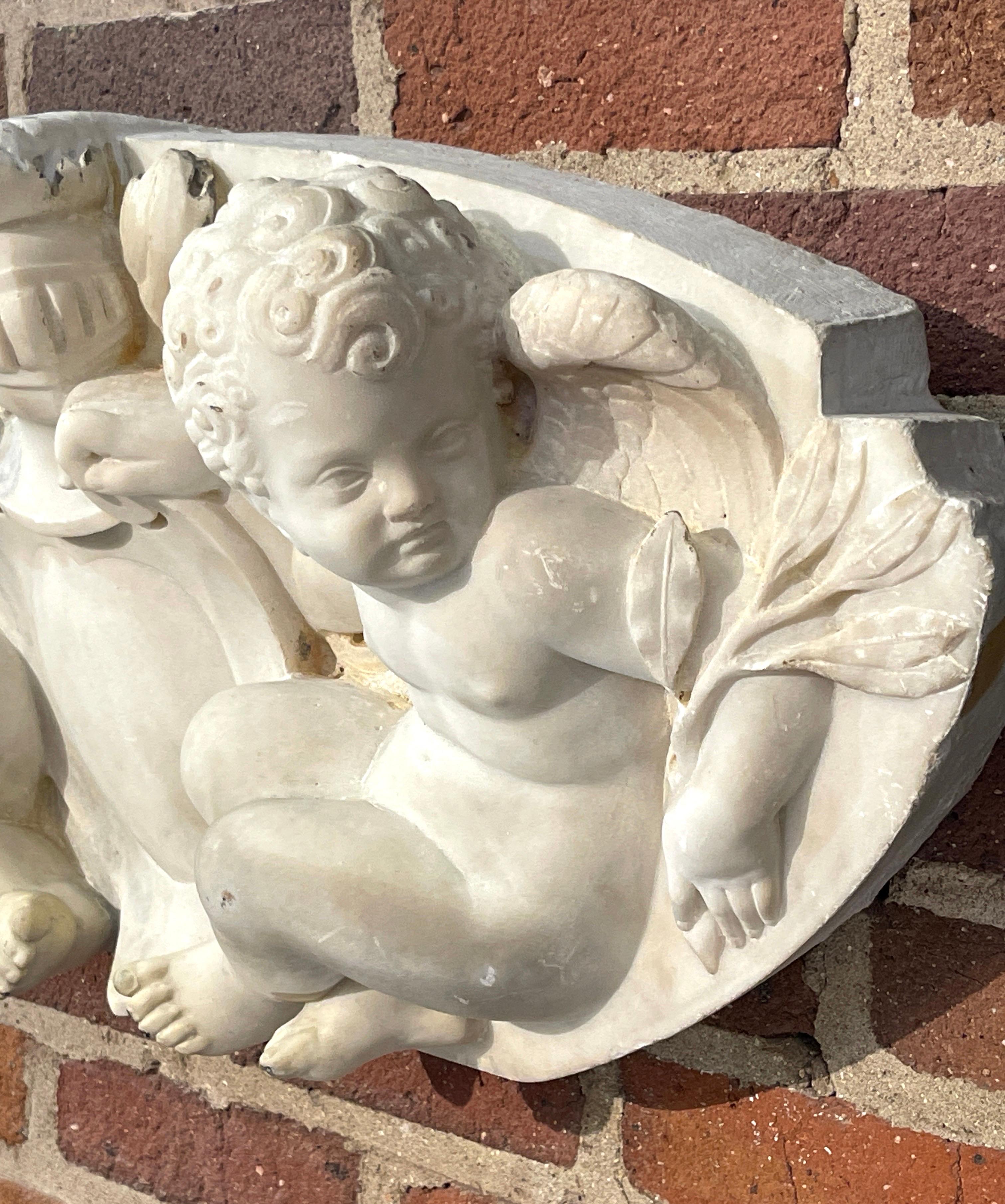 19th Century Italian Carved Carrera Marble Figural Putti Coat of Arms In Good Condition For Sale In West Palm Beach, FL