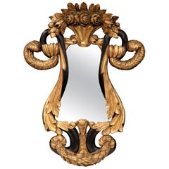 19th Century Italian Carved Giltwood and Black Lacquered Wall Mirror