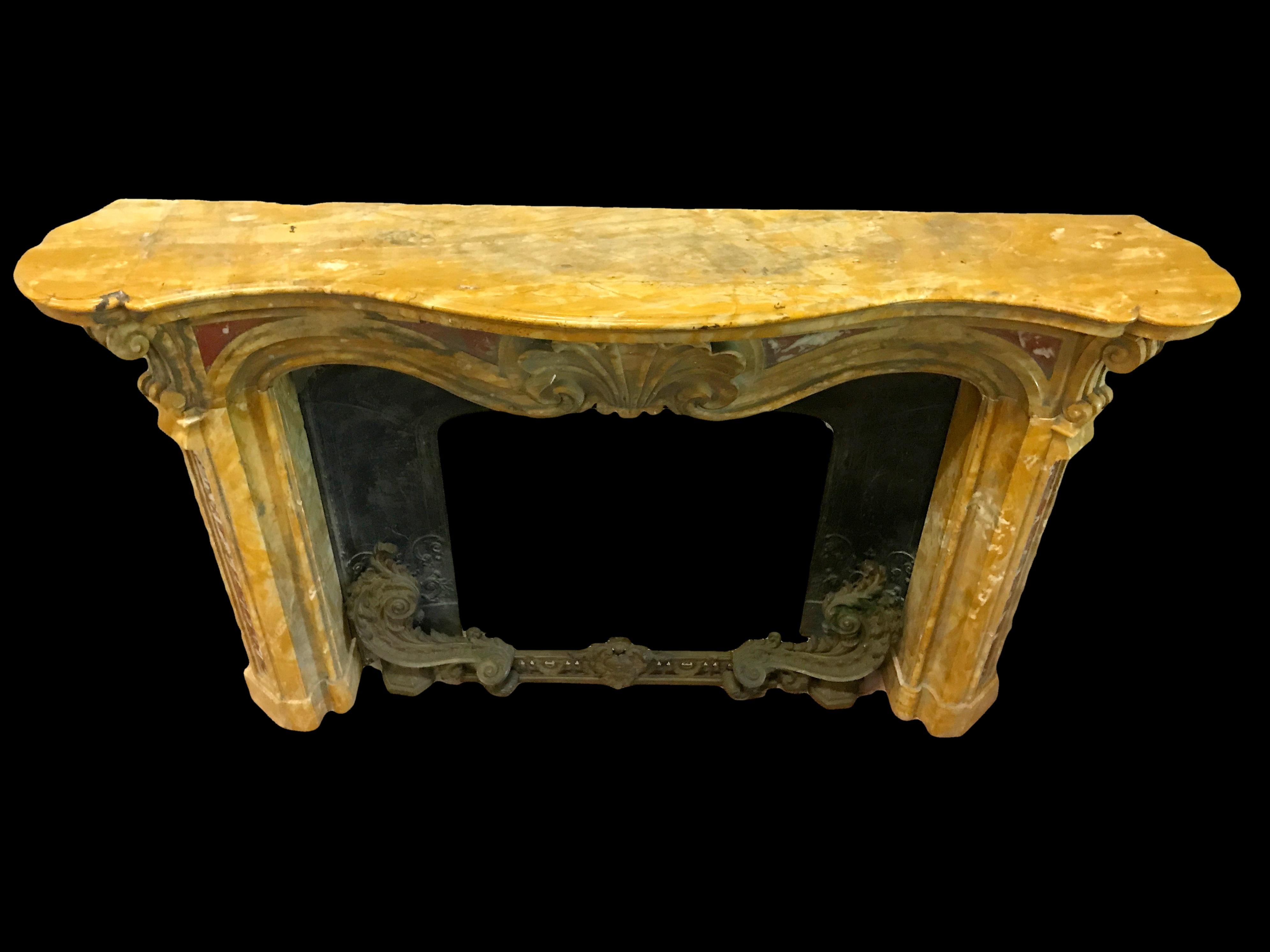 Hand-Carved 19th Century, Italian Carved Old Yellow Marble Fireplace