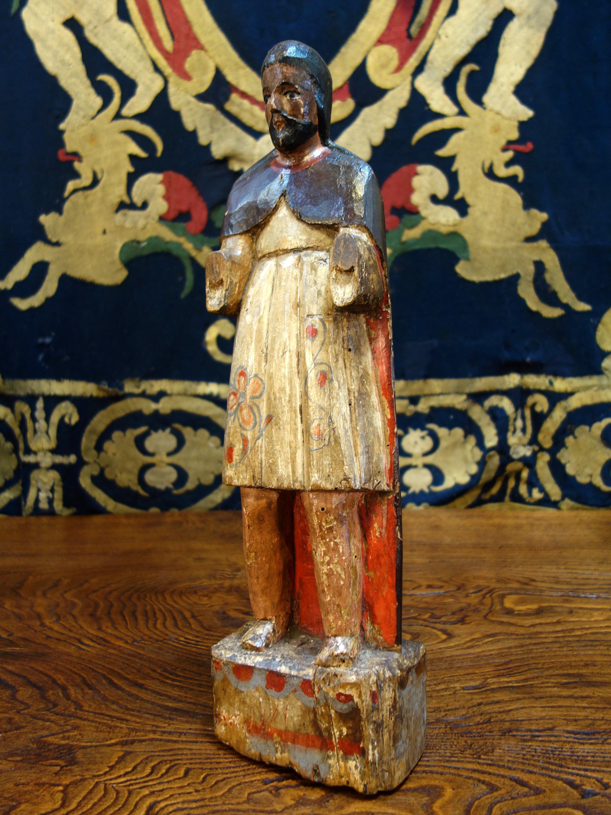 19th century Italian hand carved and painted primitive male Santos wood sculpture, circa 1840.

Measures: 22.2” H x 6.3” W x 4” D.