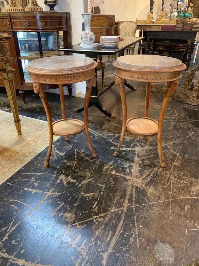 Gorgeous 19th century Italian carved pine neoclassical tables. Interesting ram's head carvings on the legs and beautiful marble tops. Lovely decorative accent pieces! Note: Price listed is for 1 table.