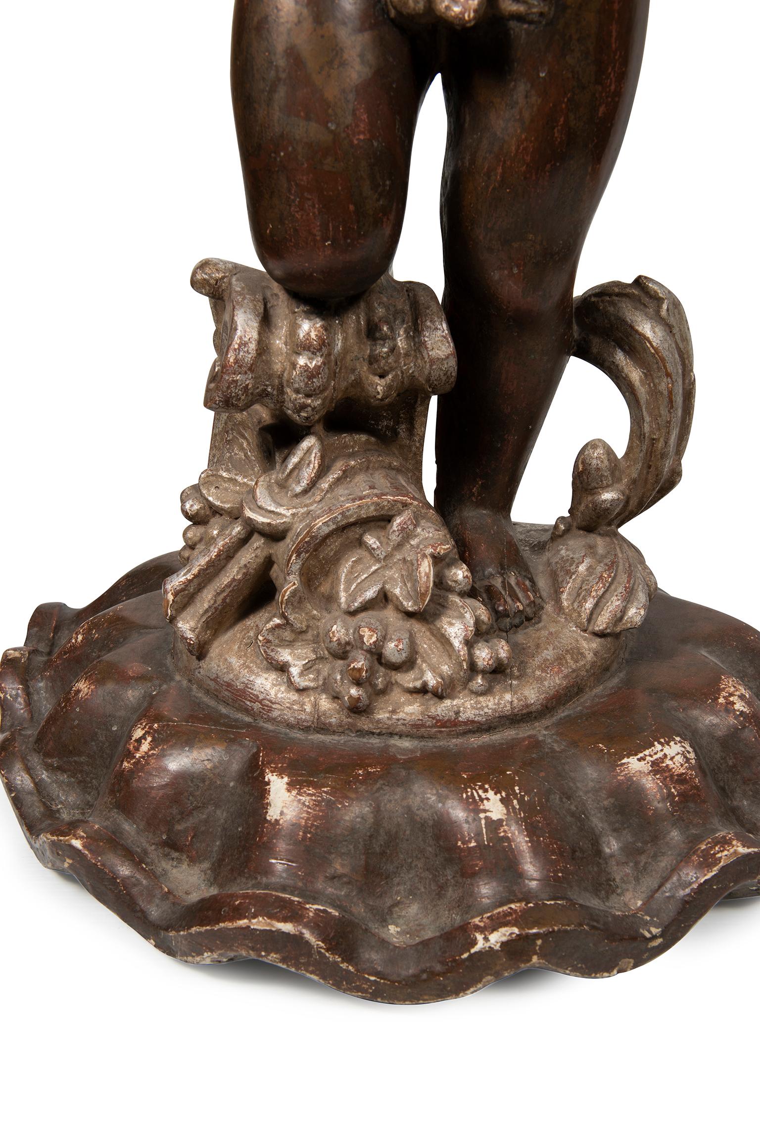 Baroque 19th Century Italian Carved Timber and Silver Gilt Putto For Sale