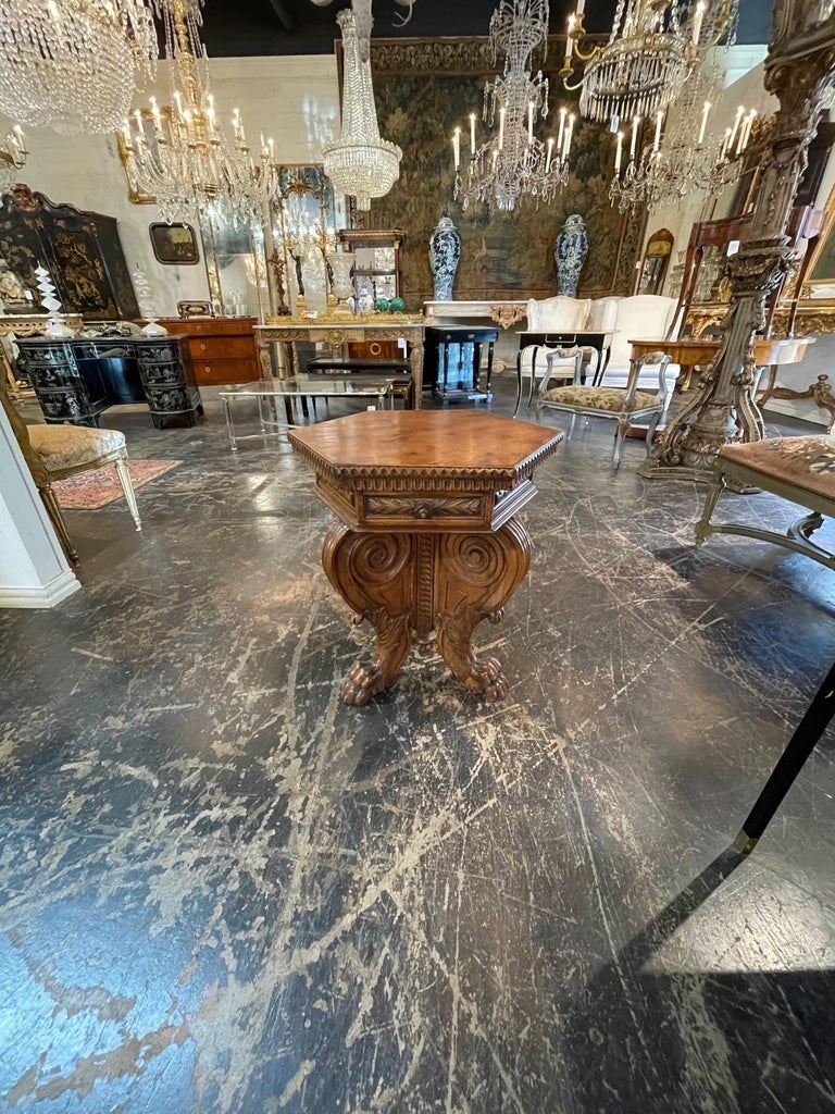 Very fine 19th century Italian carved walnut hexagonal side table. Exceptional carvings on this decorative table. 
An interesting piece!