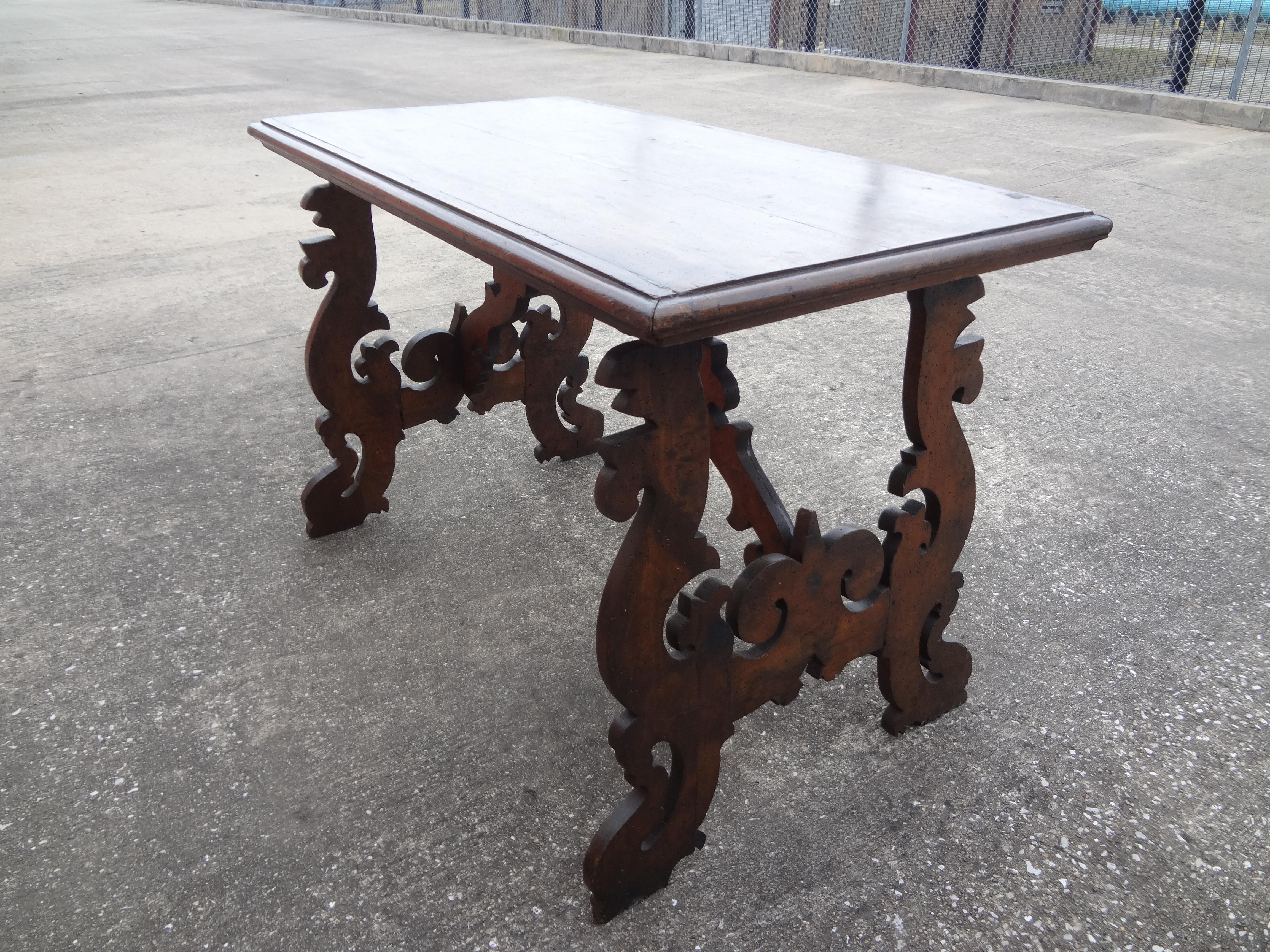 19th century Italian carved walnut table.
Stunning 19th century Italian carved walnut table or center table. This versatile rustic hand carved Italian Baroque style walnut table can be used as a center table, writing table, desk, side table or