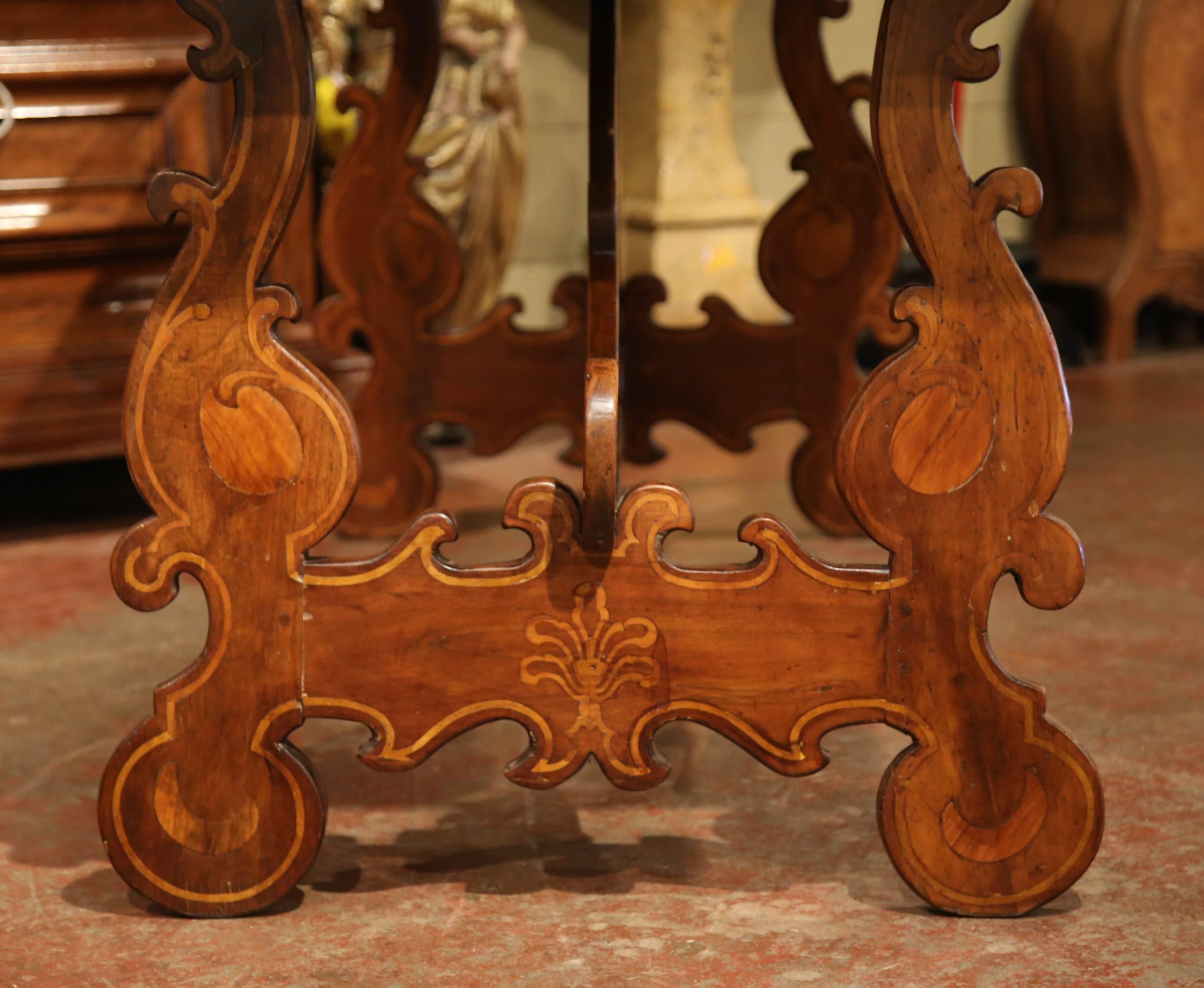 19th Century Italian Carved Walnut Trestle Table with Decorative Inlay Motifs 2