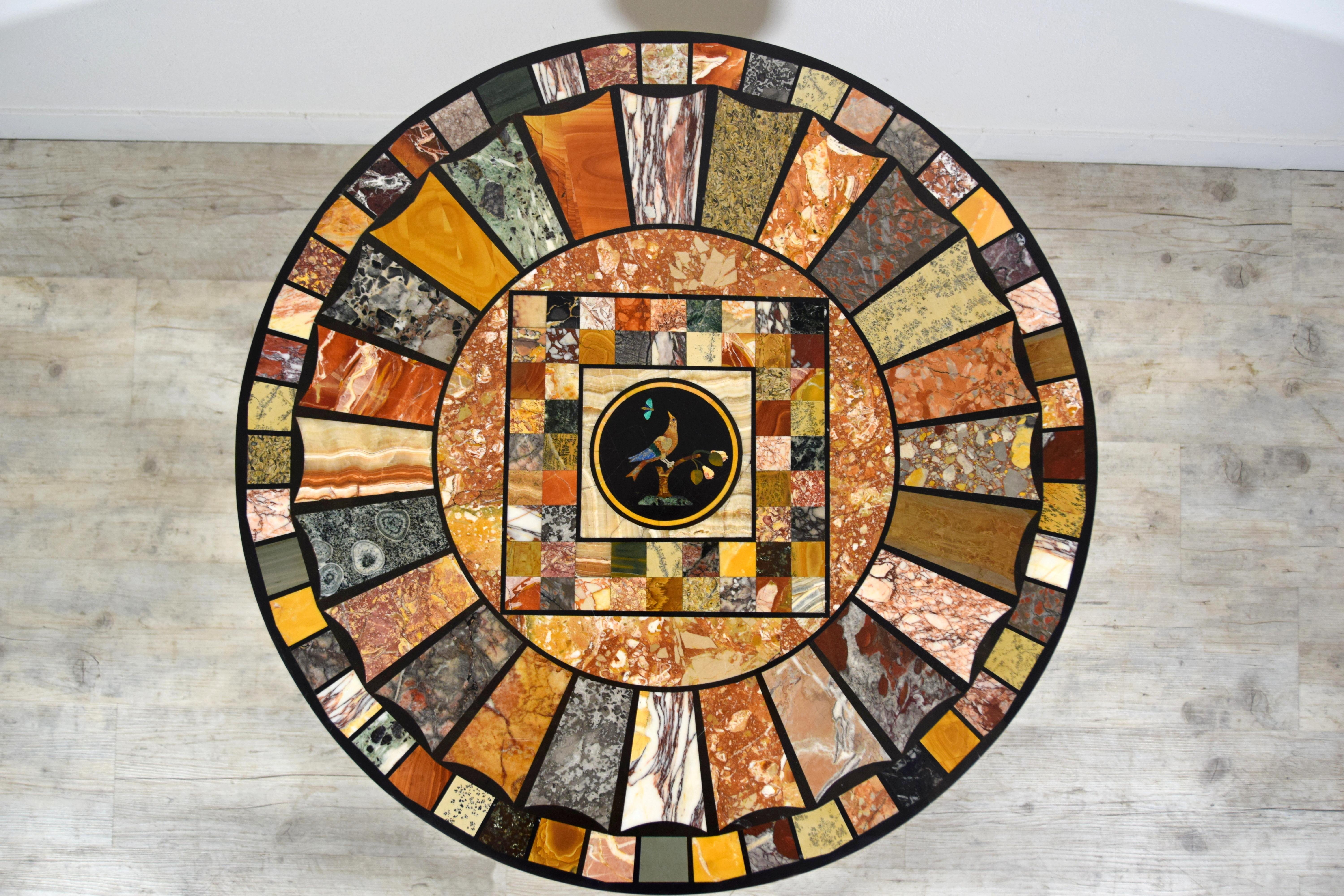 19th Century, Italian Center Table with Marble Top Giltwood Base

This refined center table was crafted in Florence between the end of 18th Century and the early 19th century.
In the style of the Grand Tour, it was one of those objects sought after