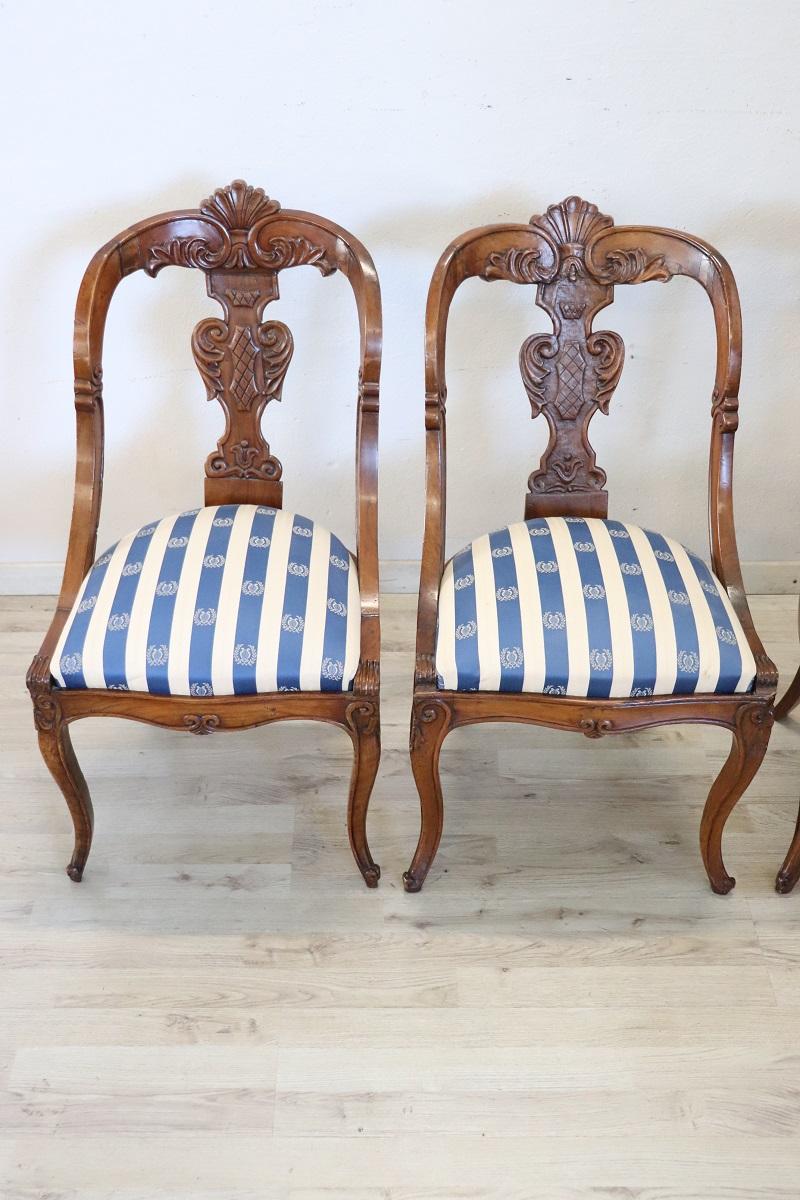 Hand-Carved 19th Century Italian Charles X Carved Walnut Set of Four Antique Chairs For Sale