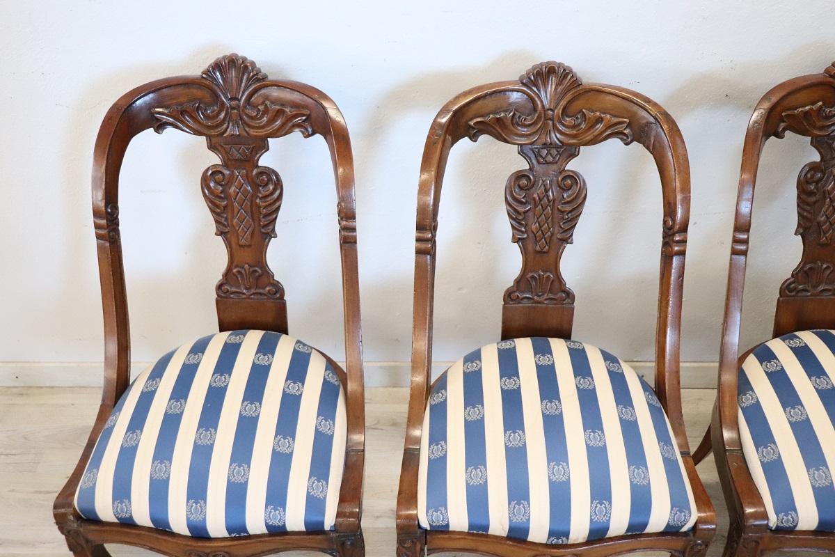 Hand-Carved 19th Century Italian Charles X Carved Walnut Set of Four Antique Chairs For Sale