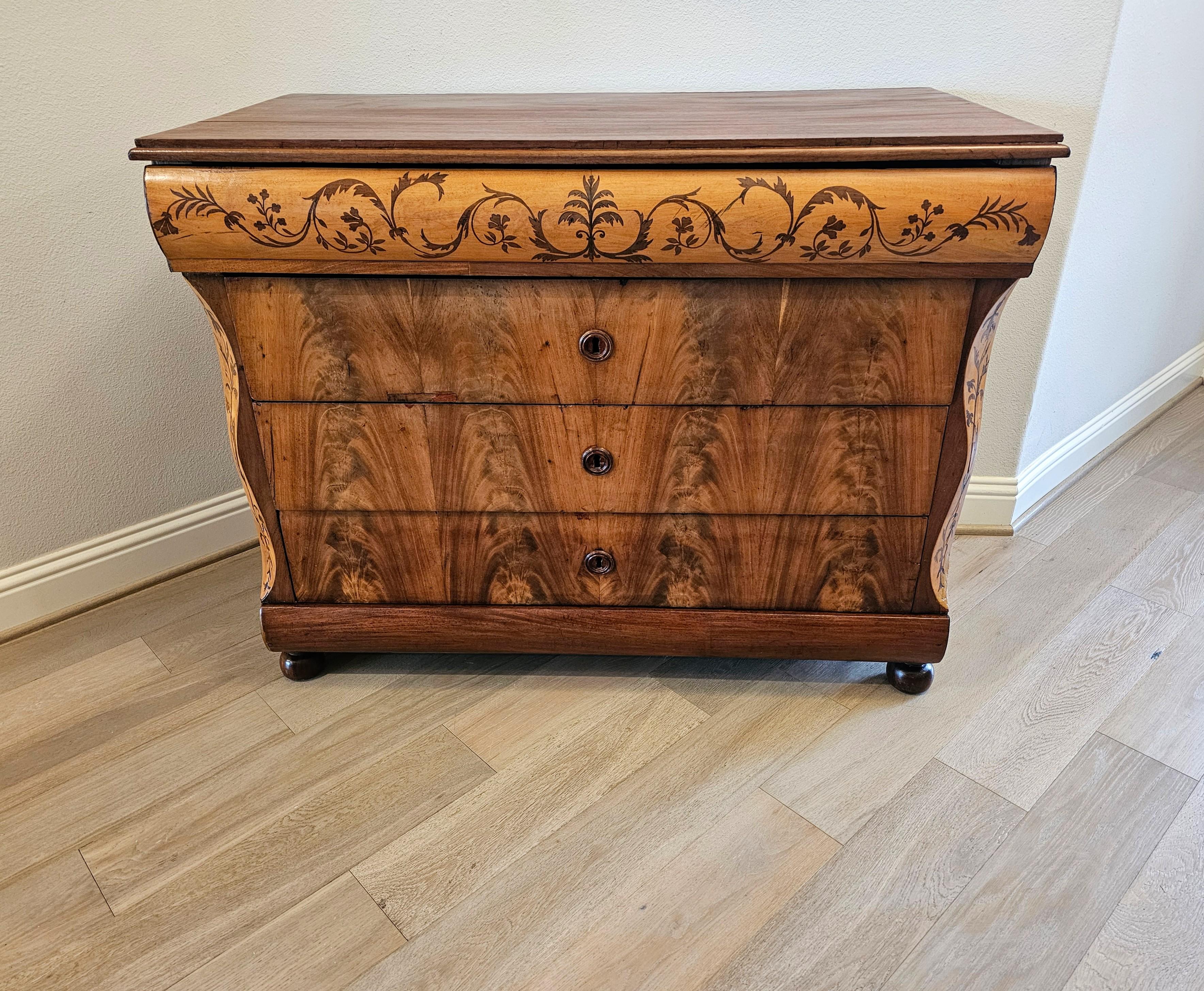 A rare, likely one-of-a-kind antique Italian mixed wood fiolated scroll flourish marquetry chest of drawers commode. 

Hand-crafted in Italy in the early 19th century, in period Charles X Restoration (1824-1830) taste, having a rectangular cherry