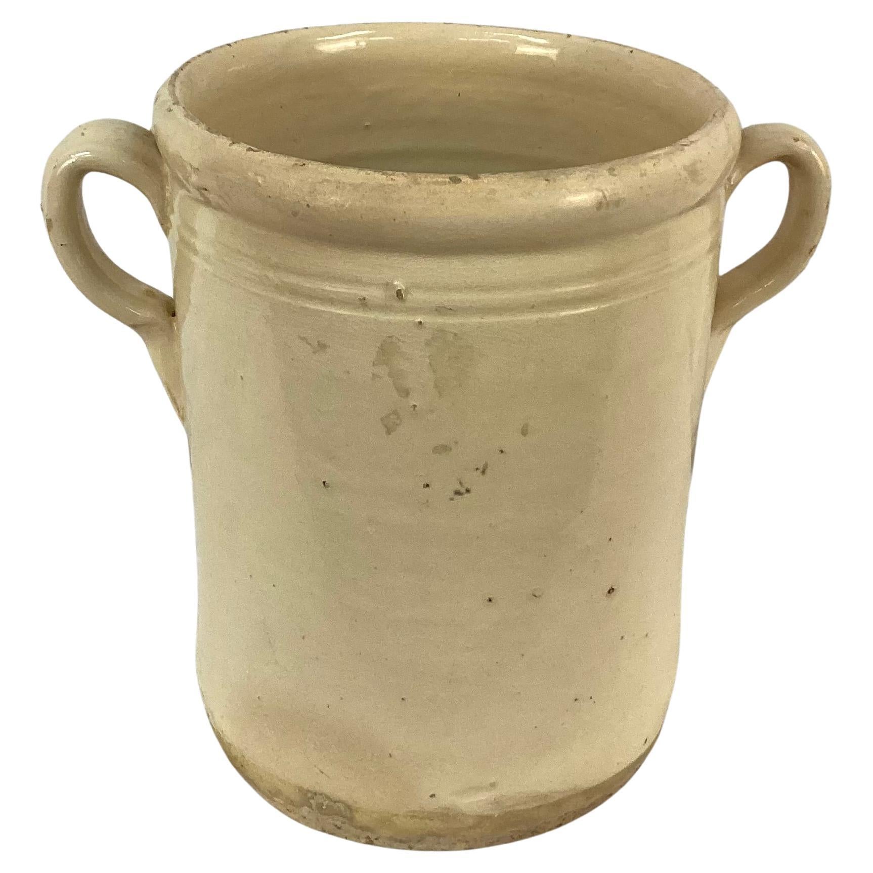 19th Century Italian ceramic chiminea preserve pot with handles. These pots were used to preserve food such as fruits, meat or vegetables. They were designed to be used in conjunction with wood-burning stove or fireplace as warmth helped preserve