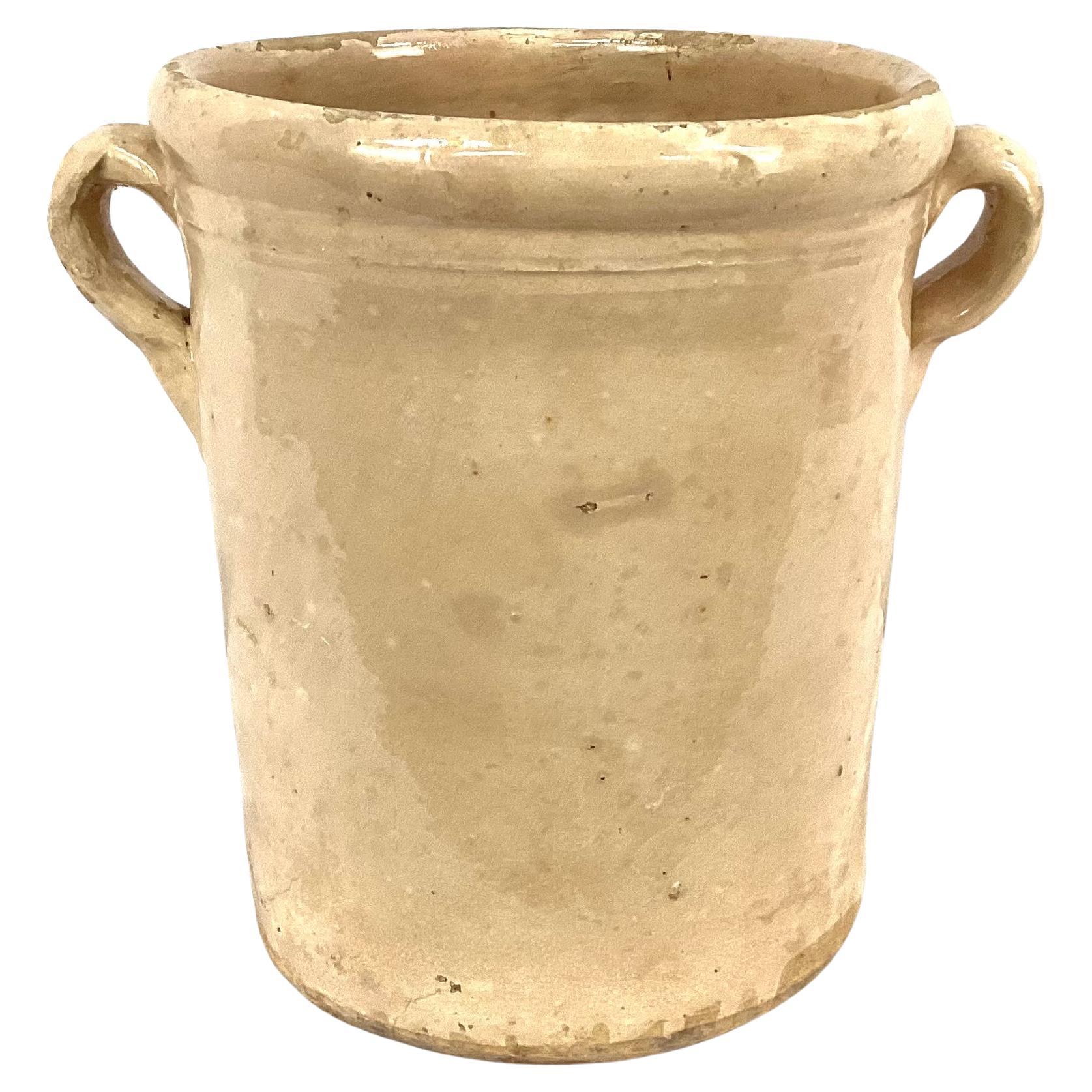 19th Century Italian ceramic chiminea preserve pot with handles. These pots were used to preserve food such as fruits, meat or vegetables. They were designed to be used in conjunction with wood-burning stove or fireplace as warmth helped preserve