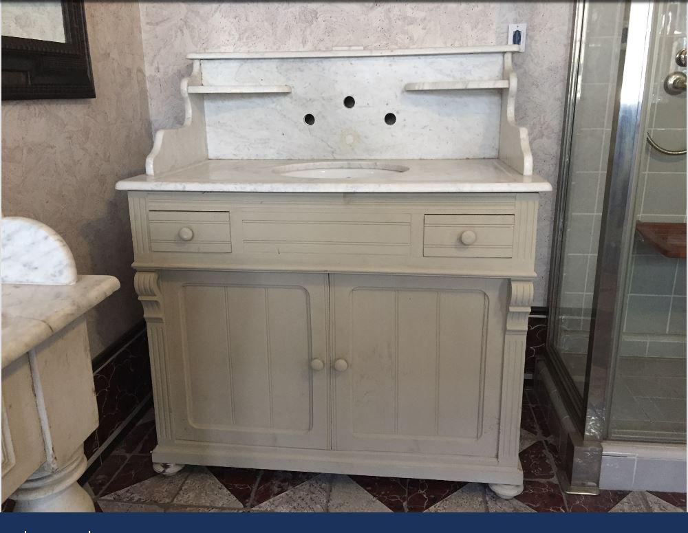 19th century Italian cupboard sink with drawers and shutters and Carrara marble top. 1890s.