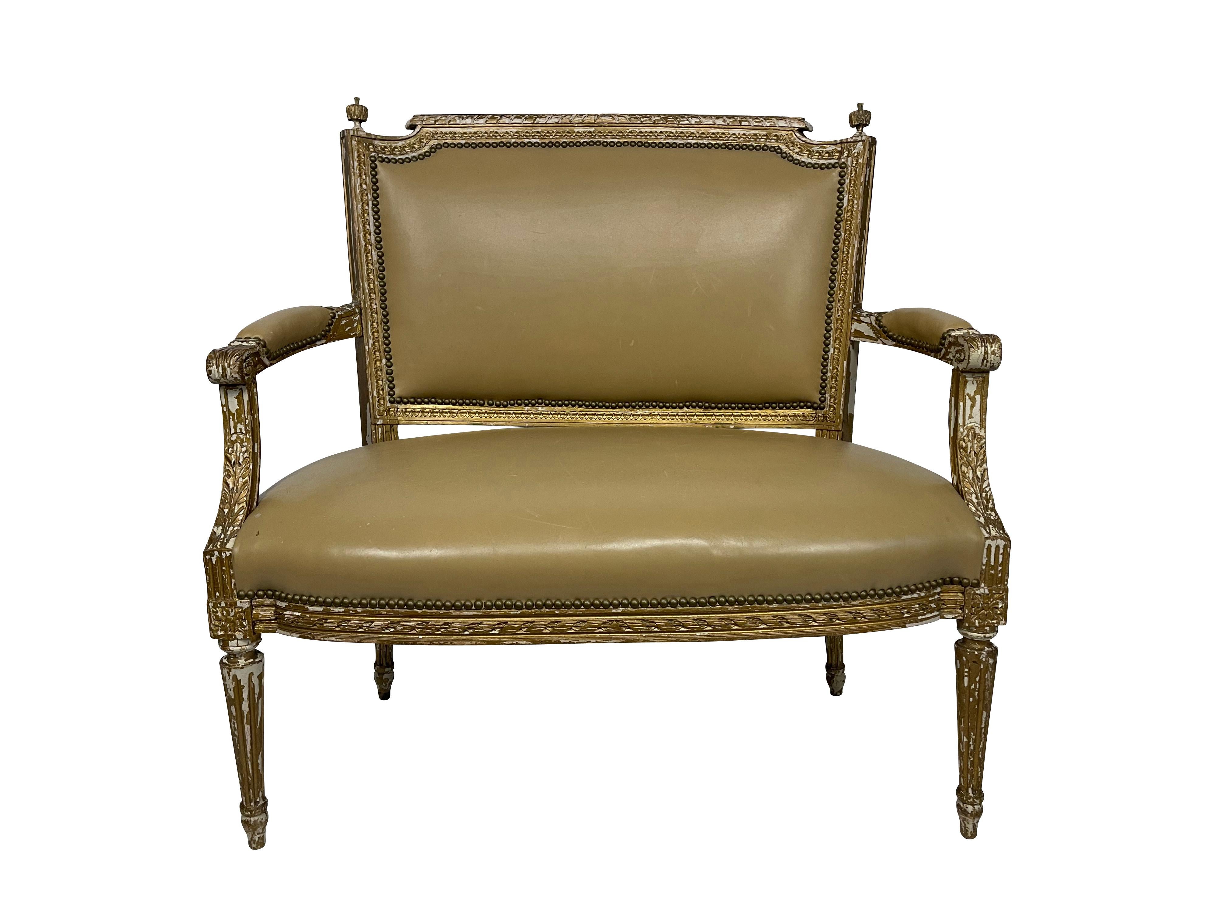 19th century diminutive size Italian painted classical settee covered in original tan leather with nailheads trim. Perfect size for a small foyer or entryway. Great patina and just enough paint loss.
