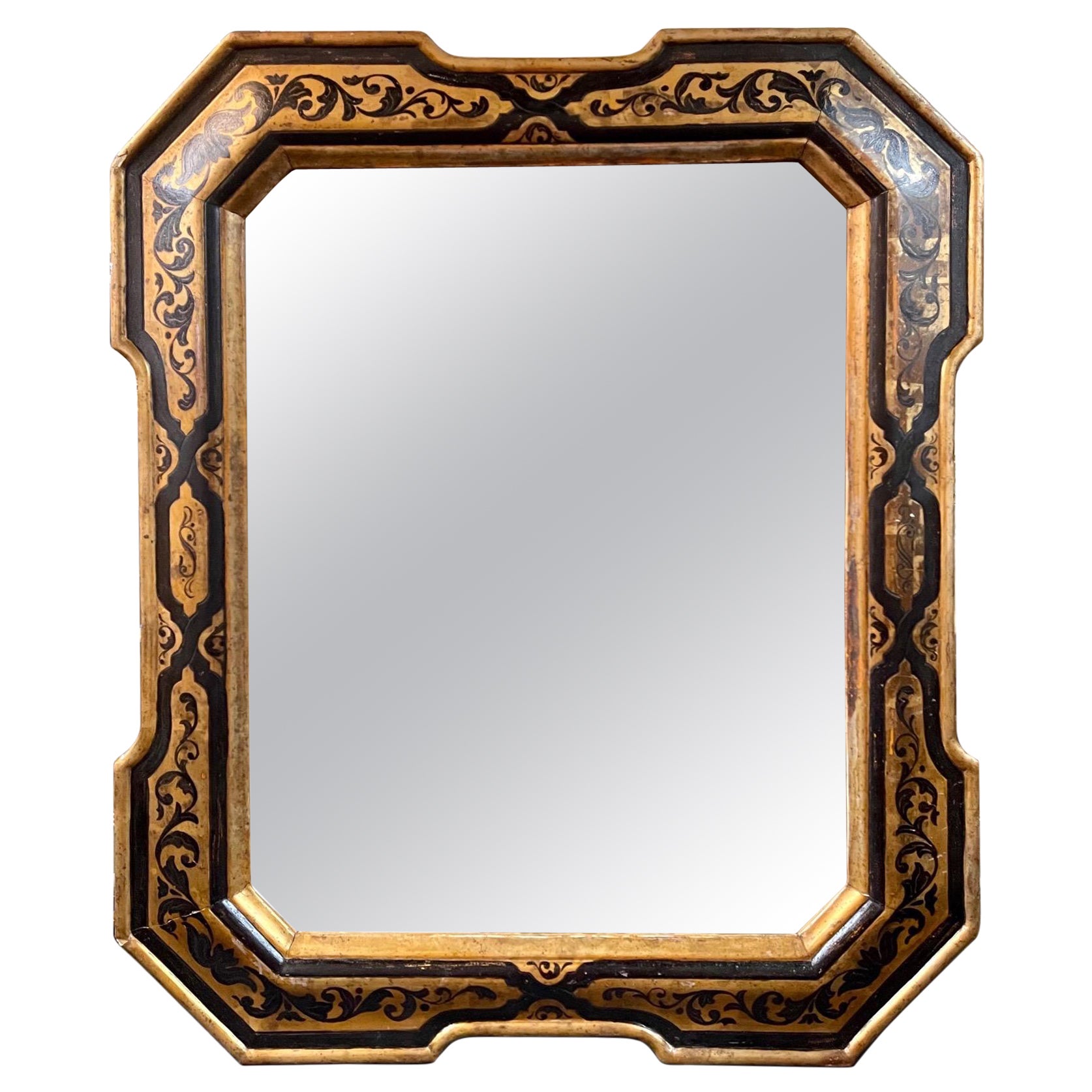 Miroir italien du XIXe siècle en ébène et bois doré