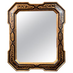 Miroir italien du XIXe siècle en ébène et bois doré