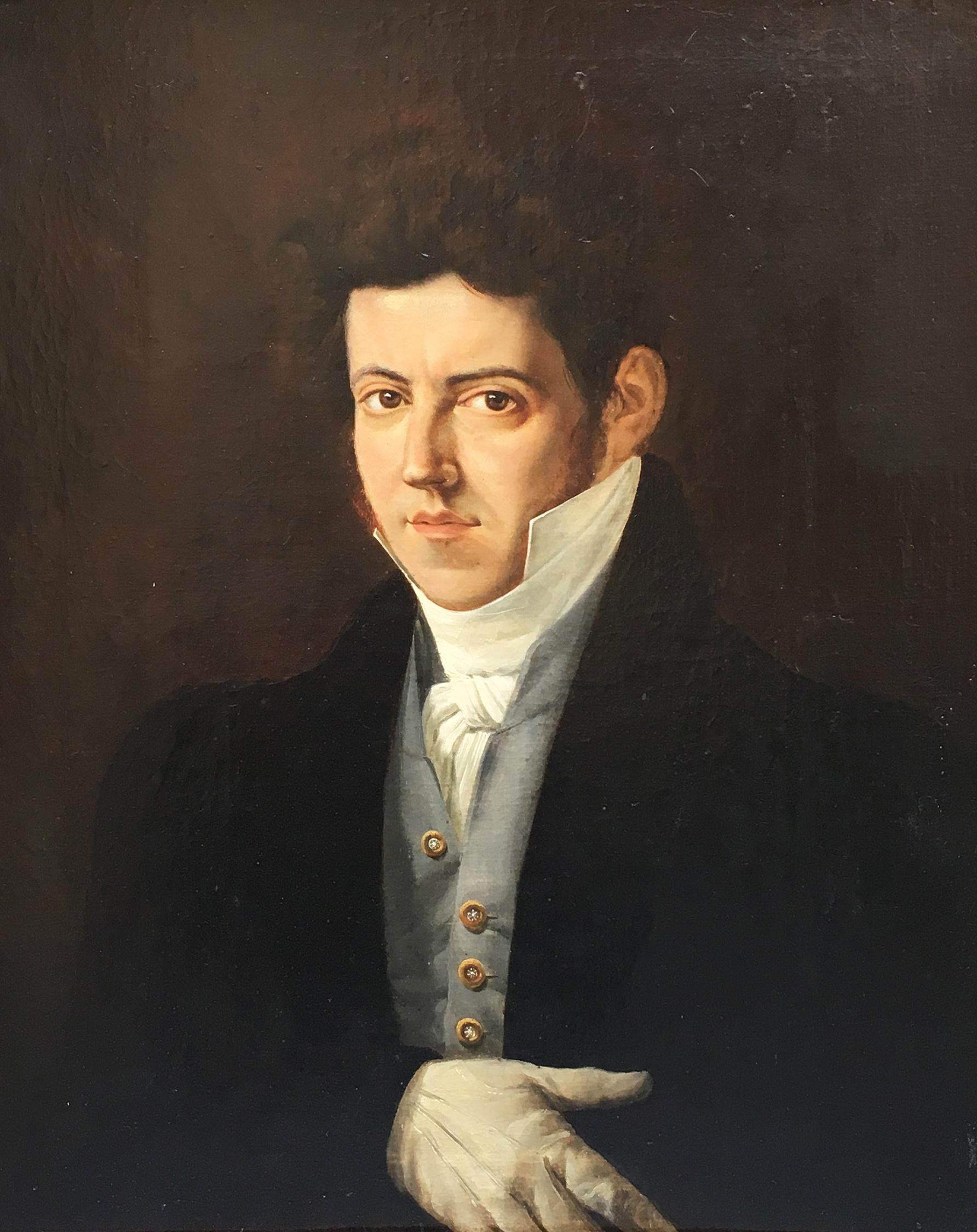 A charming Italian Empire oil on canvas painting depicting the portrait of a young gentleman.
The painting presents an elegant giltwood frame.
 