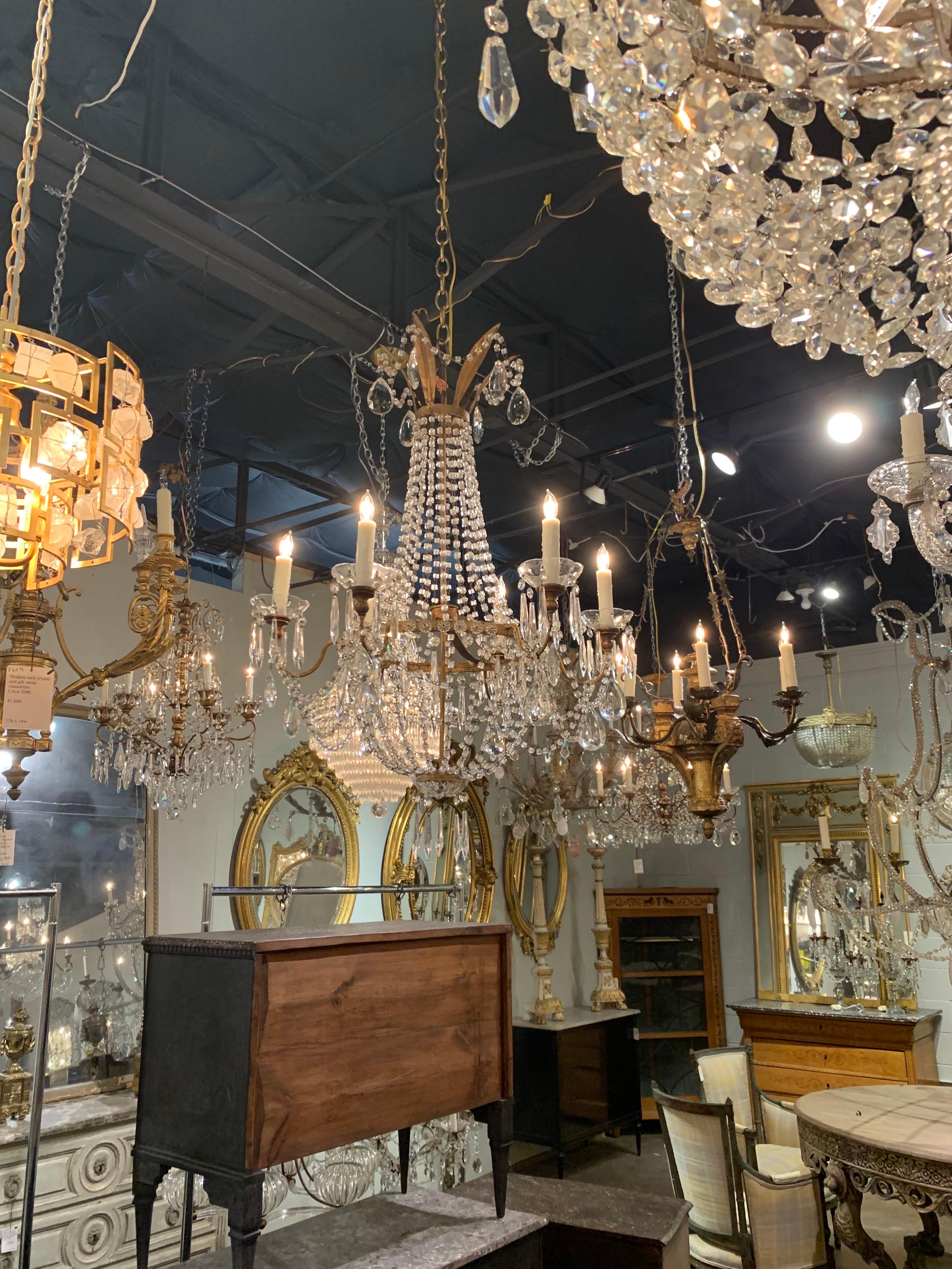 Stunning 19th century Italian Empire style gilt metal and crystal chandelier with 6 lights. Beautiful basket shape with gorgeous crystals. Creates an elegant image!