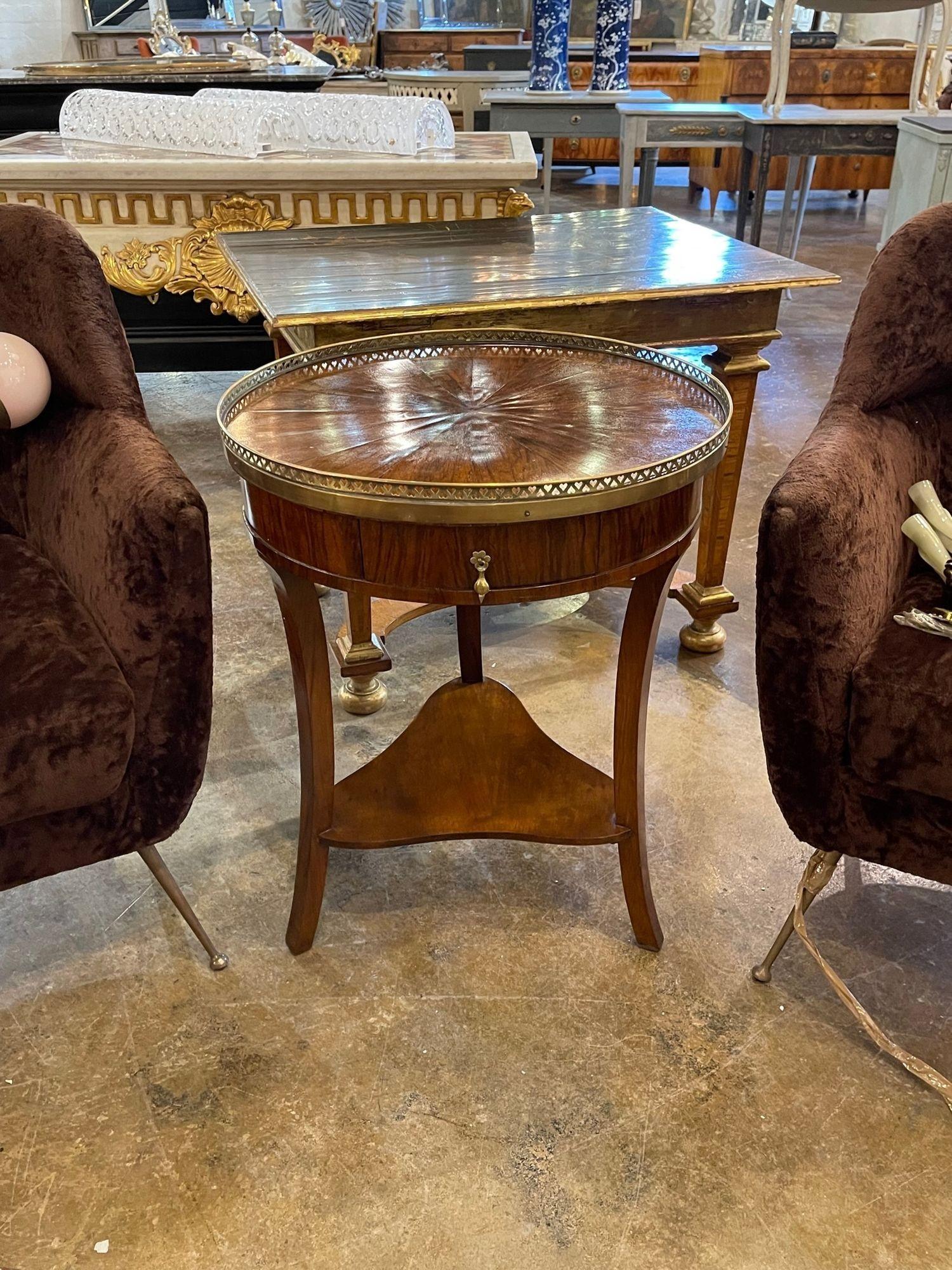 Handsome 19th century Italian Empire style walnut side table with brass gallery. A quality piece with a beautiful finish. Perfect for the traditional home!