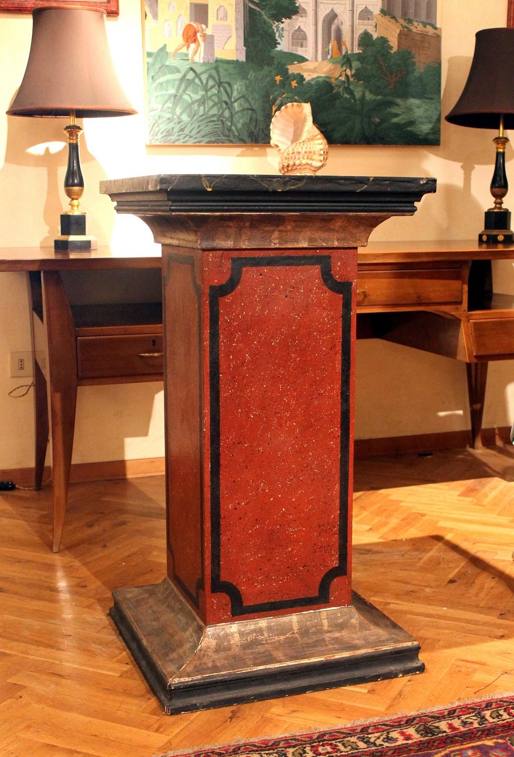 This antique pair of gorgeous late 19th century Italian carved wood architectural pedestals or columns features rectangular form and a wonderful faux marble red, black and silvered lacquer finish. Wide squared reinforced top and base sections with