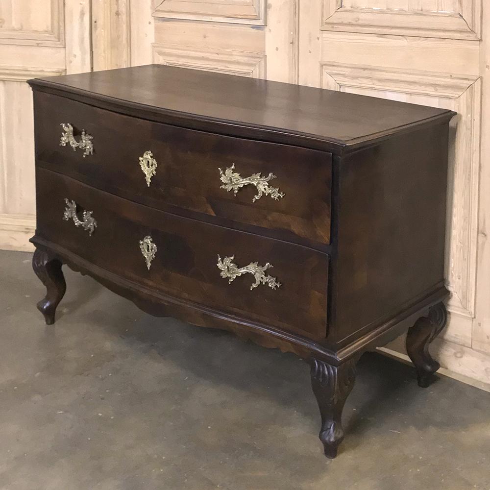 19th Century Italian Fruitwood Commode provides a delightfully artistic look that remains tailored and unassuming thanks to the rich finish on the exquisitely figured fruitwood and subtle design cues.  Even more subtle is the intriguing grain