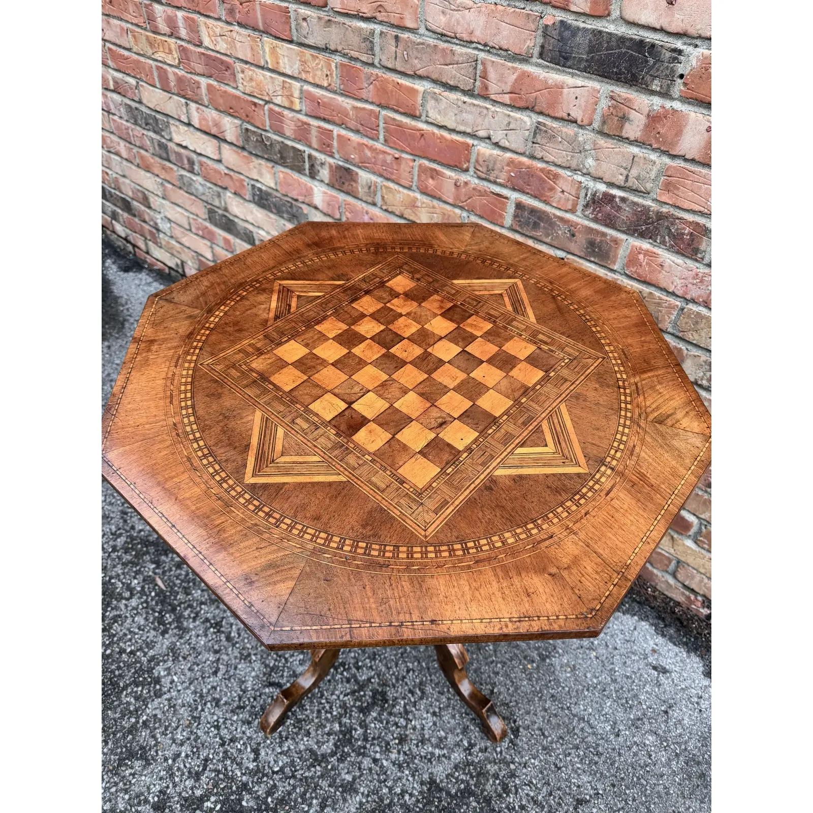 Italian antique chess table with inlaid walnut. Special and beautiful round walnut chess table. Chess part is inlaid in the shape of a star. Real craftsmanship. The top is fully inlaid and the 64 chess fields as well. The chess squares are multi
