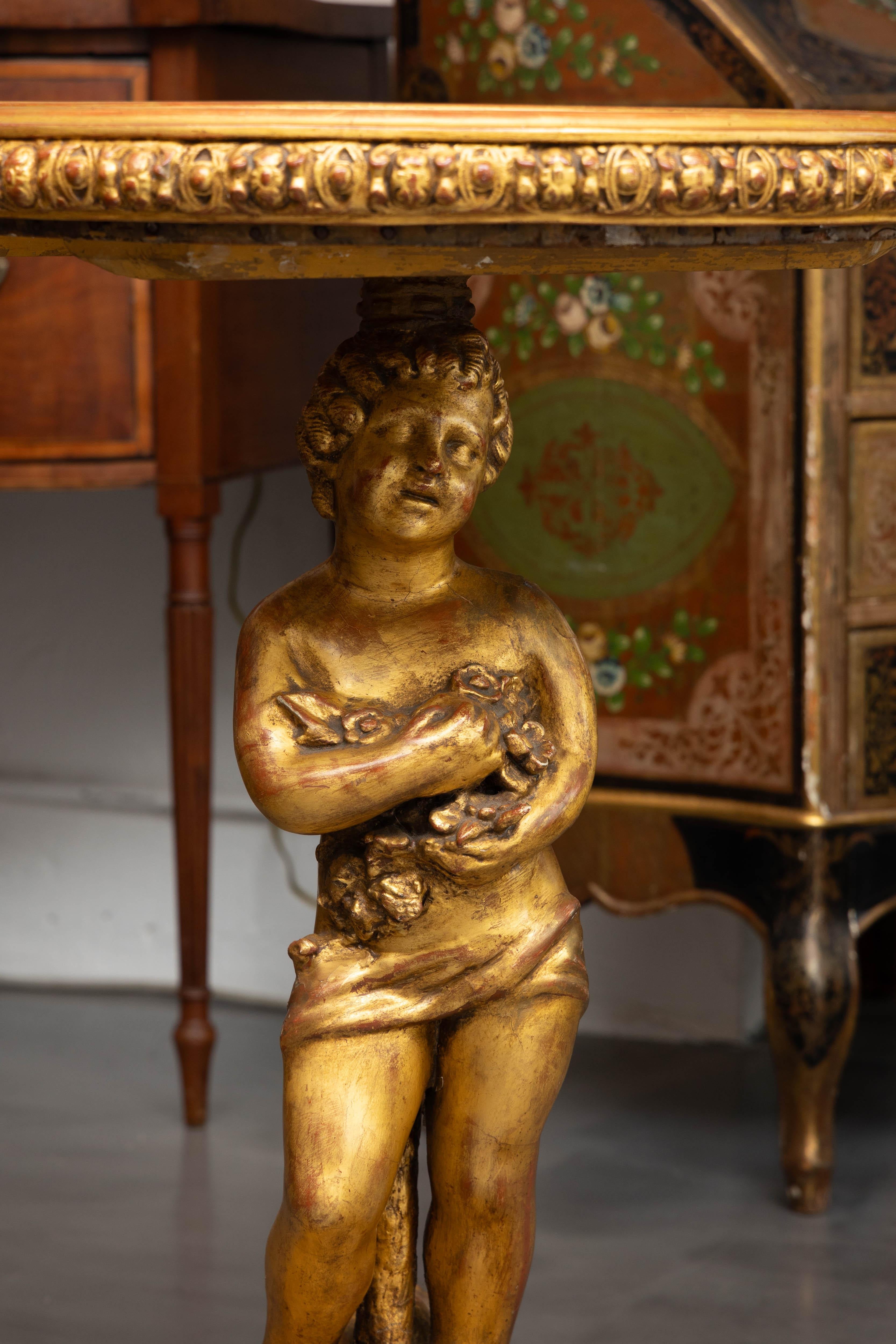 Baroque Revival 19th Century Italian Gilt Carved Putto with Marble Top For Sale