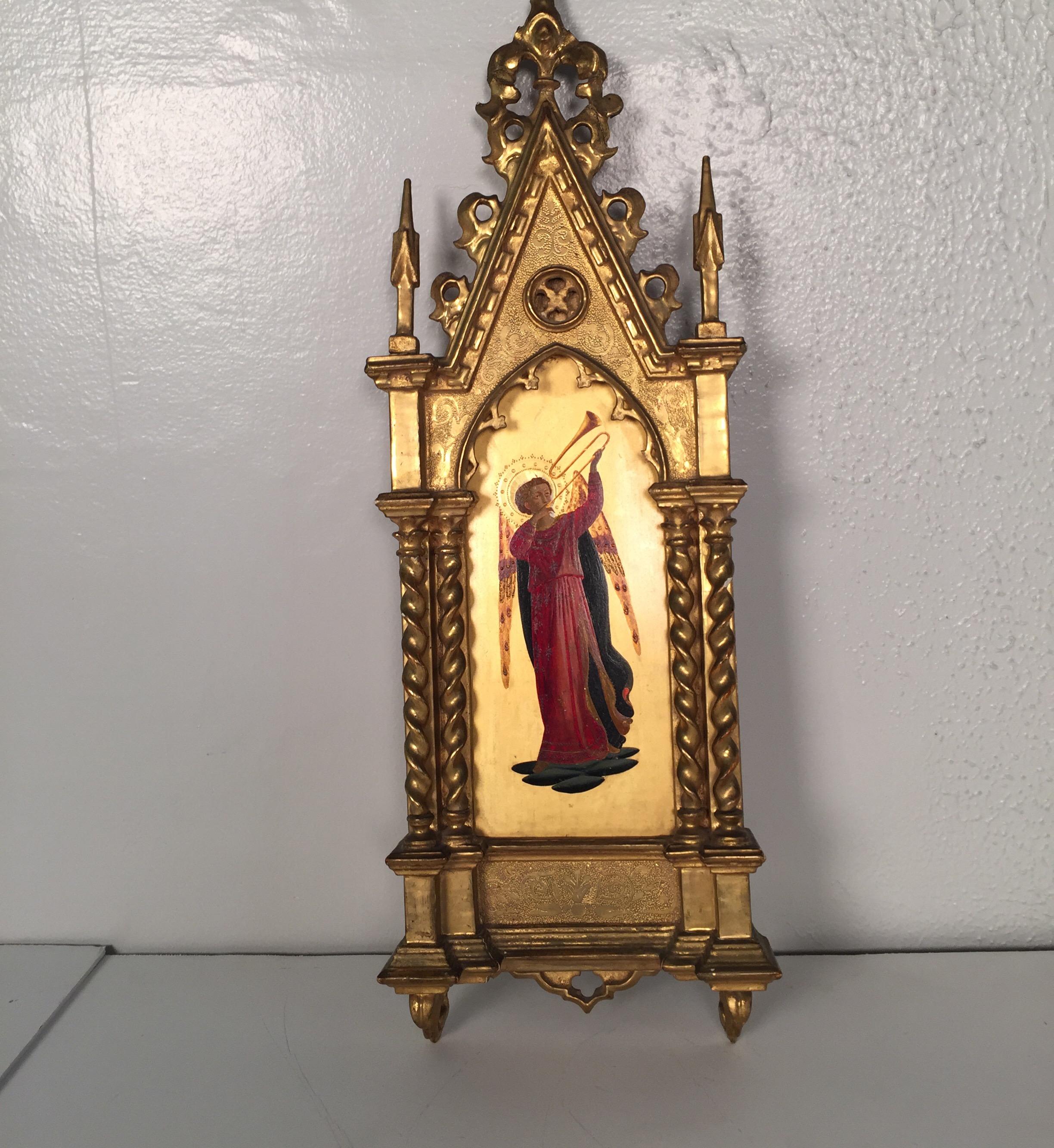 Beautiful painting on board in elaborate Gothic frame of Archangel Gabriel. 19th century Italian in architectural Gothic frame with vibrantly colored depiction of Gabriel with a gilt background.