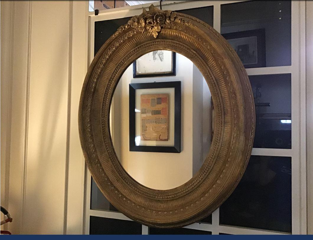 19th century Italian gilt wooden framed oval mirror. 1890s