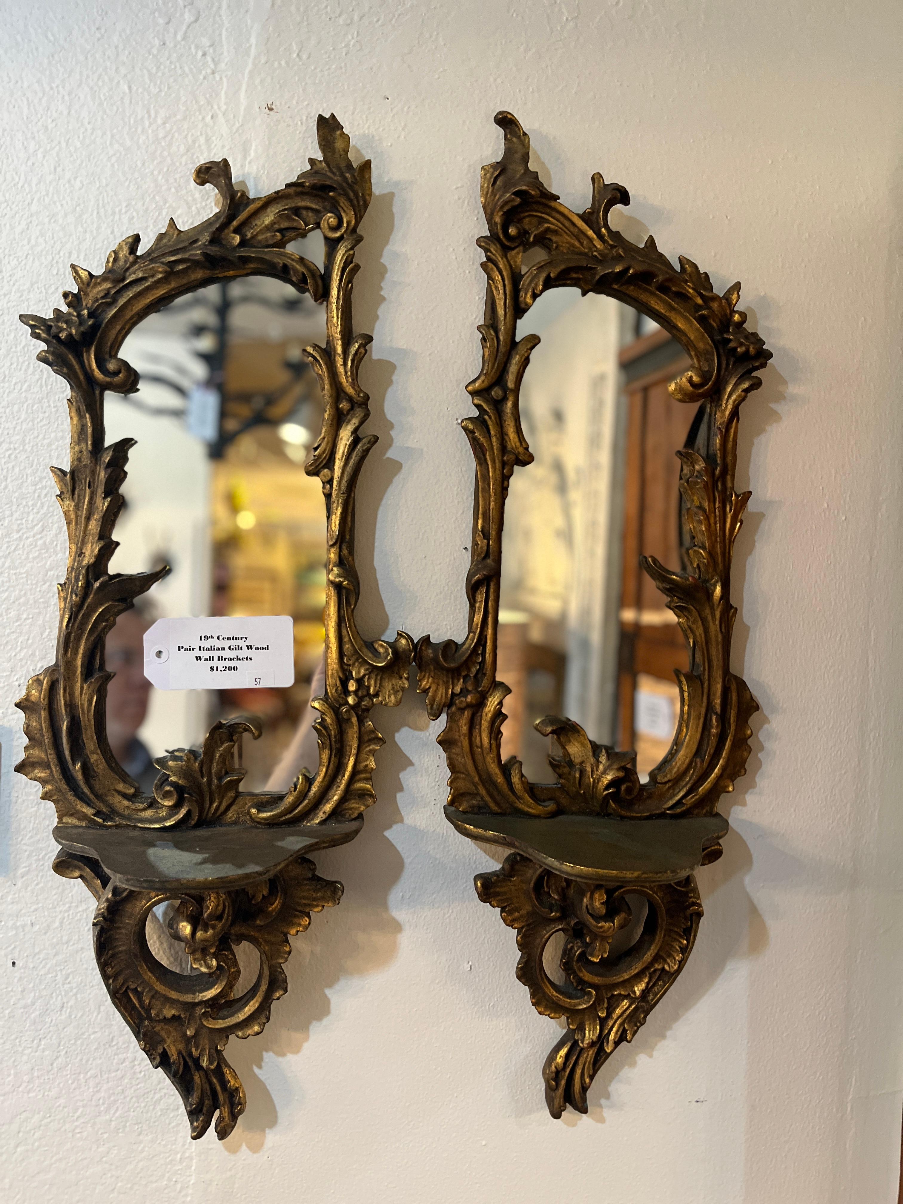 19th Century Italian Gilt Wood Wall Brackets.  Age appropriate wear. Quite a bit of character for this style of wall bracket/ mirror