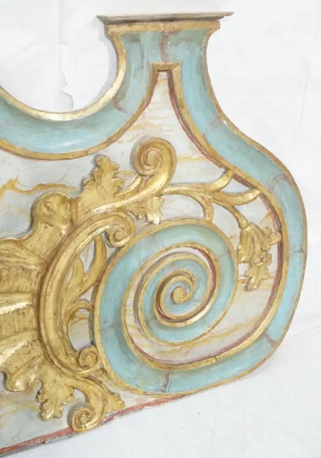 Large polychrome gilt gesso carved wood double architectural panel with decorative scroll details, carved shell and leaf design with raised molded faux marble moldings in an antiqued turquoise blue with faux marble background in creams and golds.