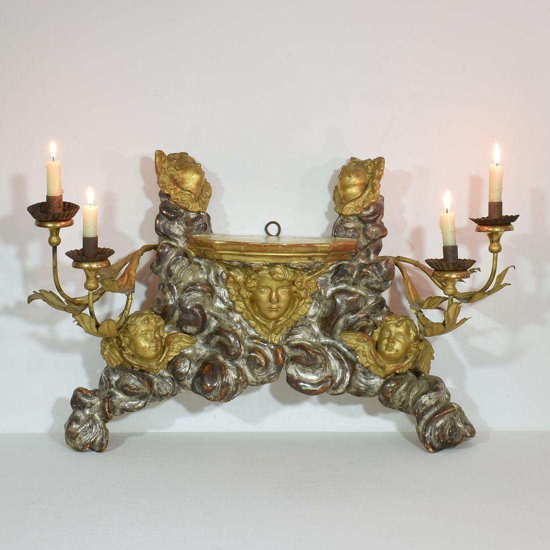 Spectacular Baroque style wall altar with candle holders and angels., Italy, circa 1850.
Despite of its age in a good but weathered condition.