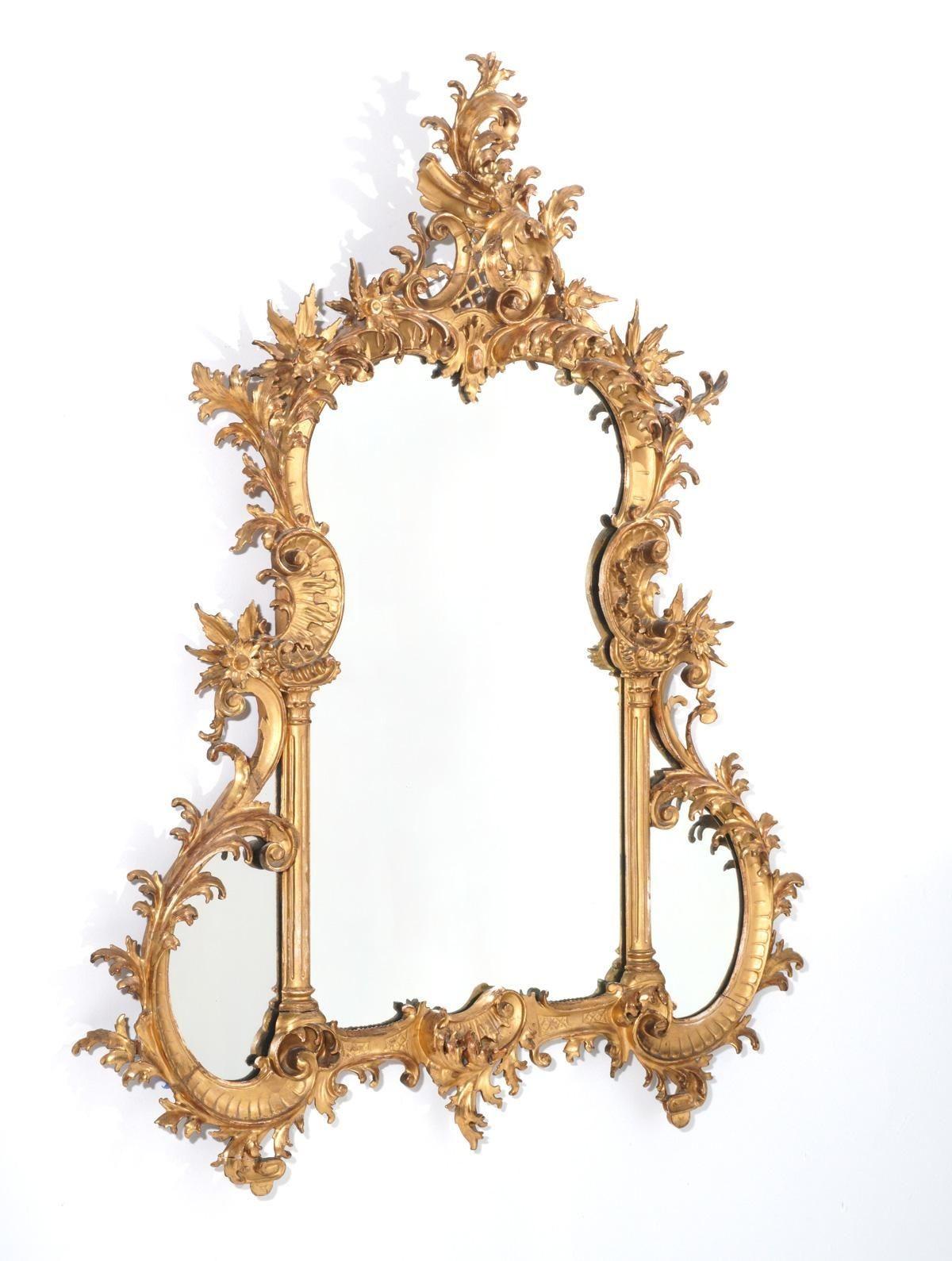 An amazing hand-carved gilt wood Rococo style mirror decorated with foliate scroll details all around the frame. Made in Italy, 19th Century. 
Dimensions:
49