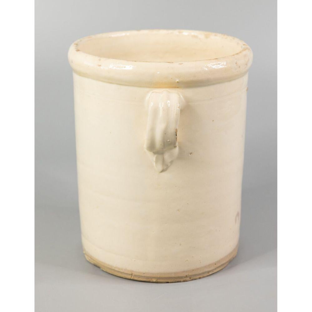 A large authentic 19th-Century Italian confit pot or jar. This pot is full of character, hand crafted and painted with two charming handles, known as 'ears'. These jars were used for storing and preserving cooked meat. It would be beautiful with a
