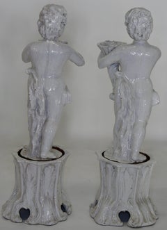 19th Century Italian Glazed Terracotta Cherubs on Tree Trunk Pedestals