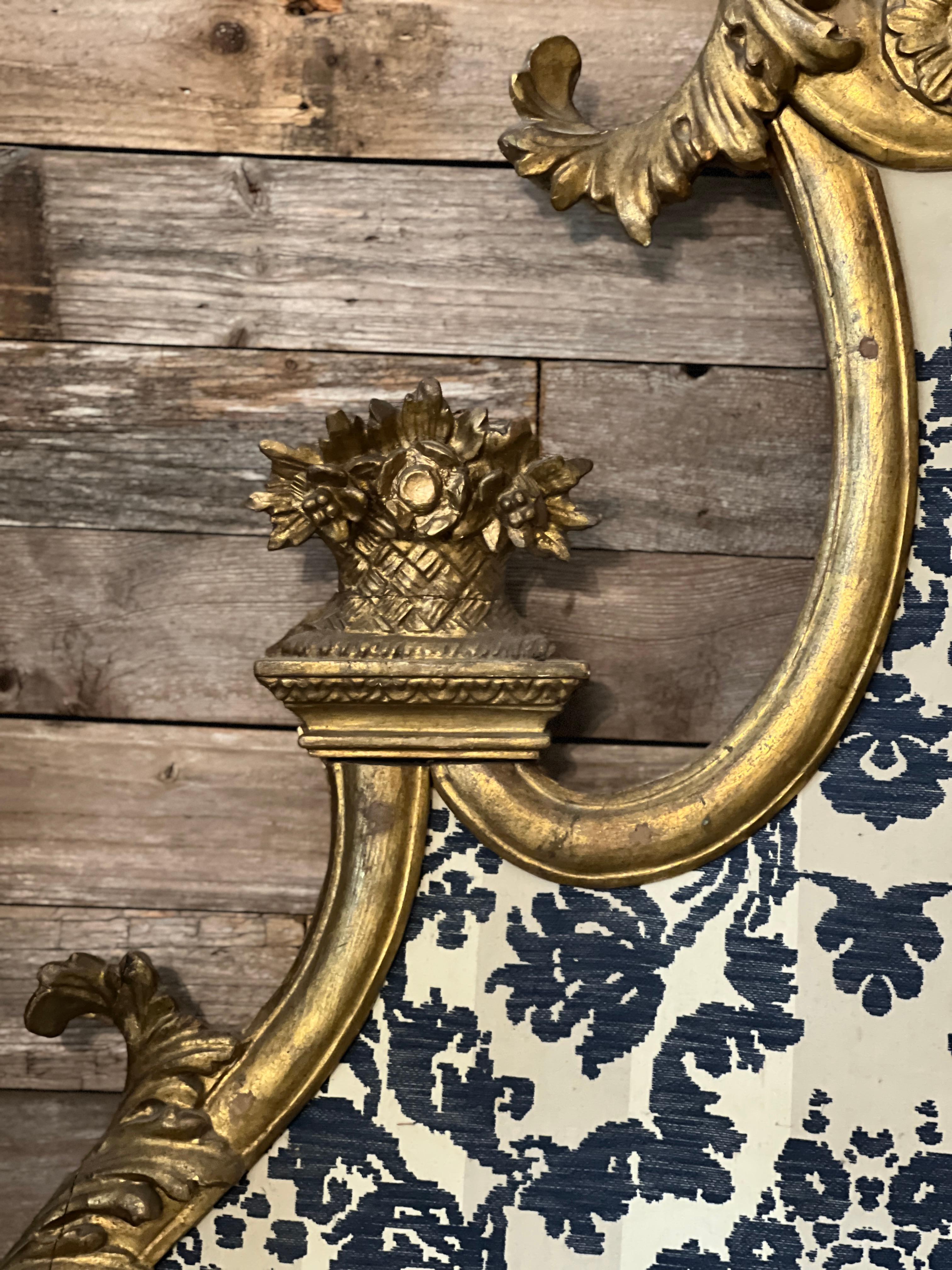 Stunning Italian gold gilt headboard featuring blue and white upholstery. Keep as is or reupholster to your liking. This is such a unique and gorgeous piece and is ready to hang on the wall. Imported from Italy. 61