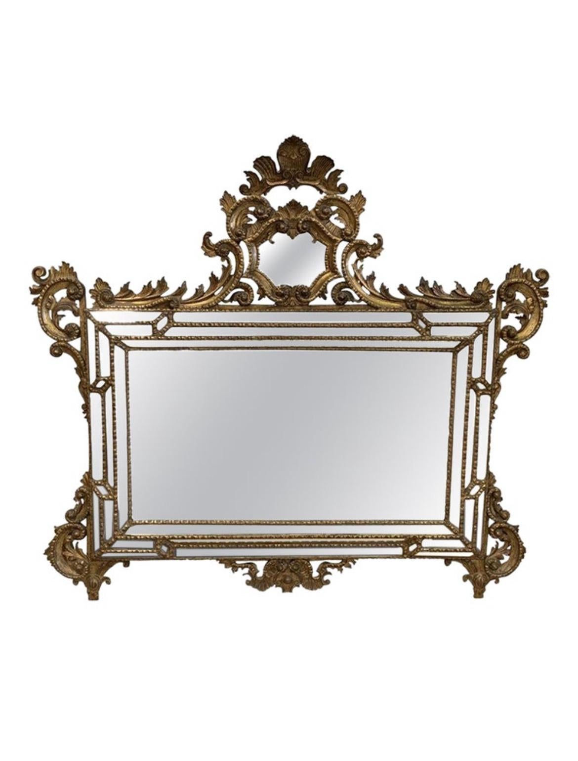 Stunning gold gilt 19th century Italian mirror that is sure to add sophistication to any design space. This mirror has inlaid mirrors on the edge that create a 3D effect. This mirror is sure to fit in any room nicely with this exquisite style and