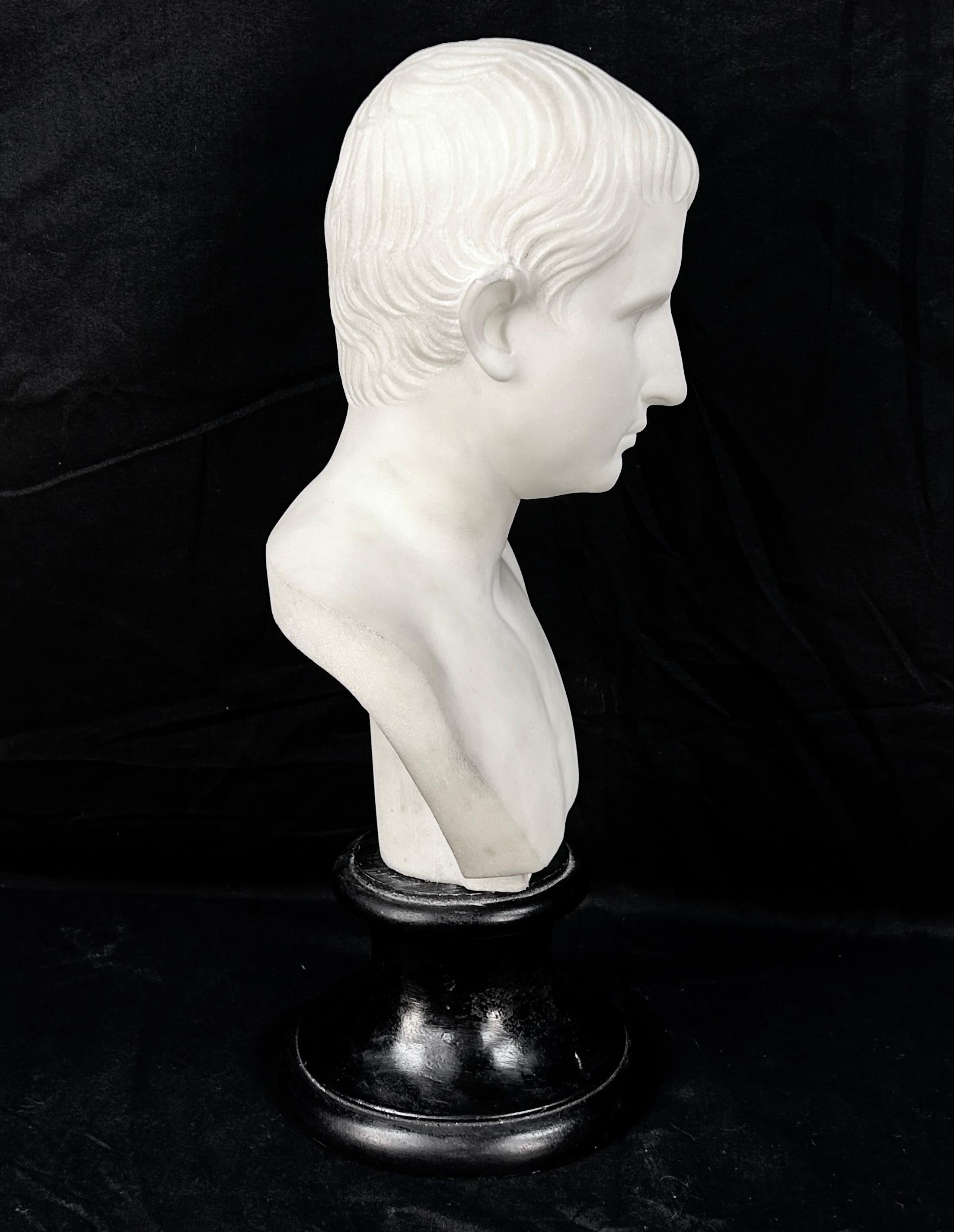 19th Century Italian Grand Tour Marble Bust of Augustus Caesar by Antonio Frilli. White marble bust is on a black plinth. Antonio Frilli was a Florentine sculptor who specialized in marble and alabaster statutes and was well known in Europe, the
