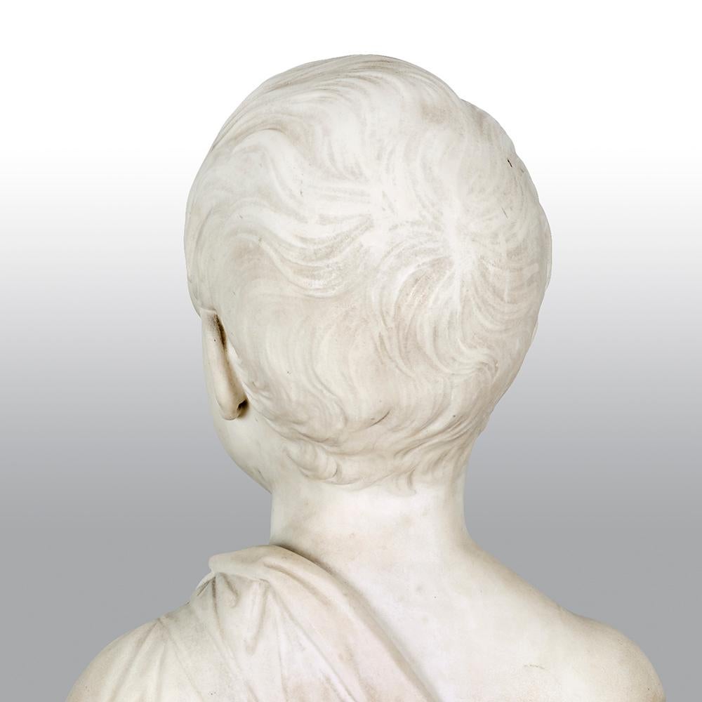 Marbre de Carrare Buste d'un jeune garçon en marbre Grand Tour d'Italie du 19ème siècle en vente